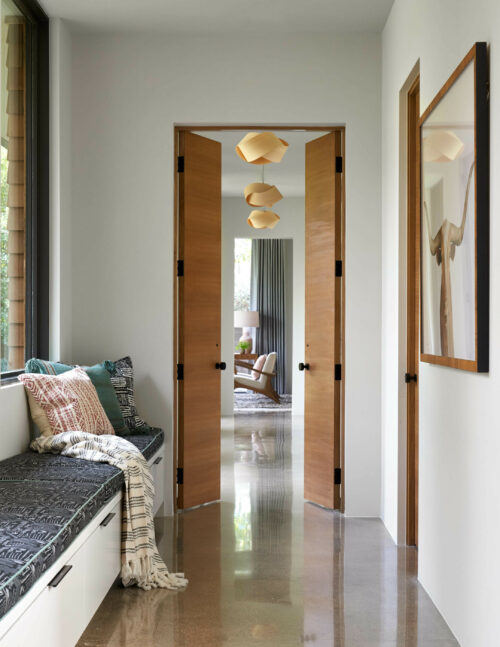 5716 Stonegate Road Dallas, TX 75209 - Photo 10 of 25 a living room with furniture and a chandelier