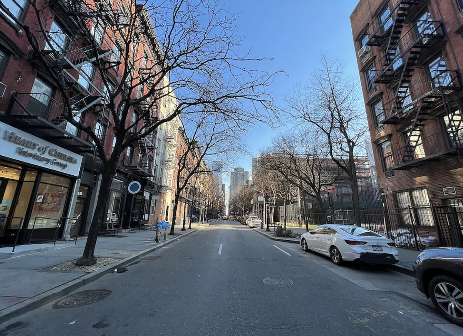 446 West 46th Street, Unit 12 Manhattan, NY 10036 - Photo 14 of 18 a view of street with parked cars