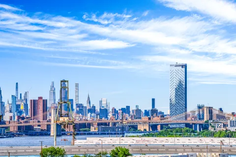 a view of a city with tall buildings