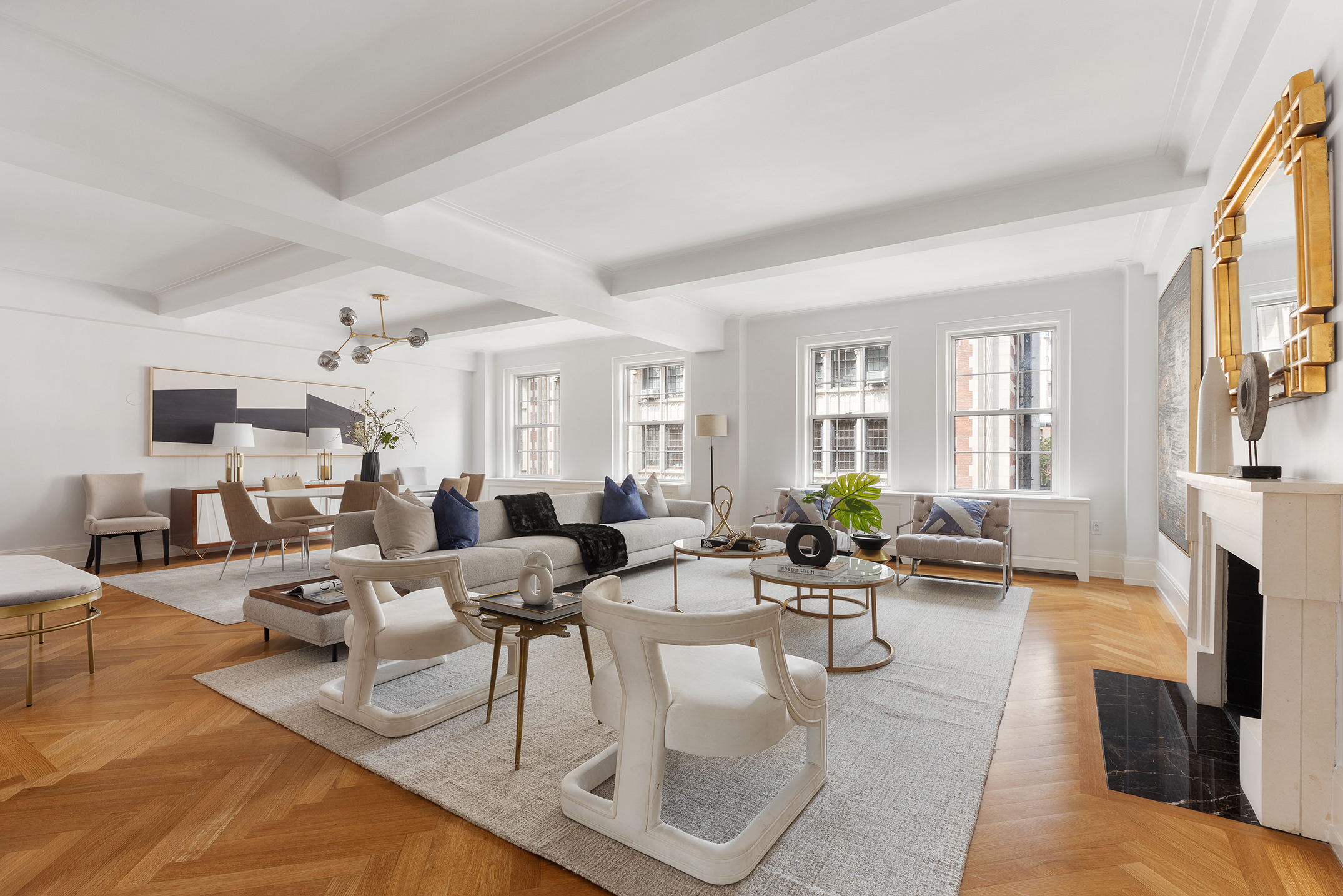40 East 66th Street, Unit 6A Manhattan, NY 10065 - Photo 1 of 21 a living room with fireplace furniture and a wooden floor