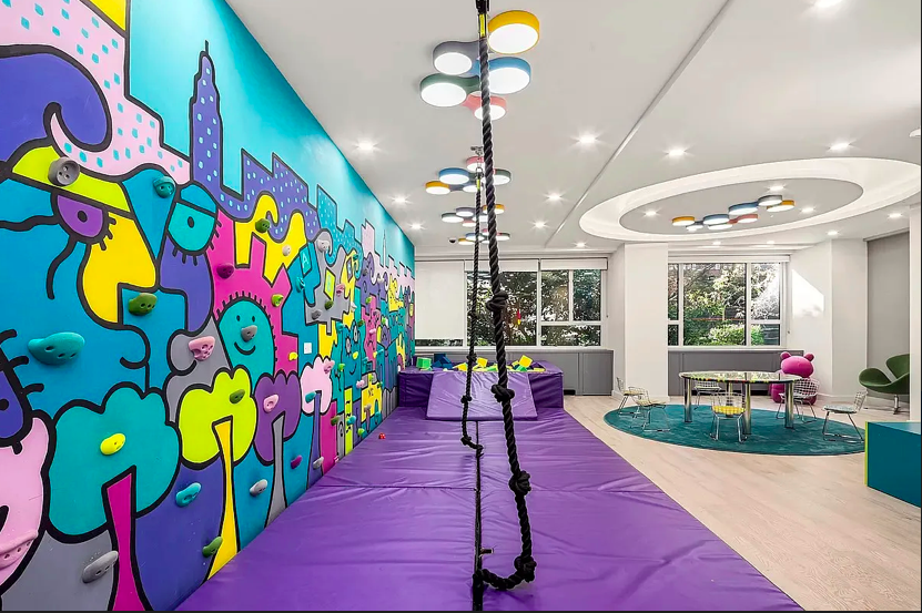 200 East 66th Street, Unit C704 Manhattan, NY 10065 - Photo 17 of 23 a living room filled with furniture and a rug