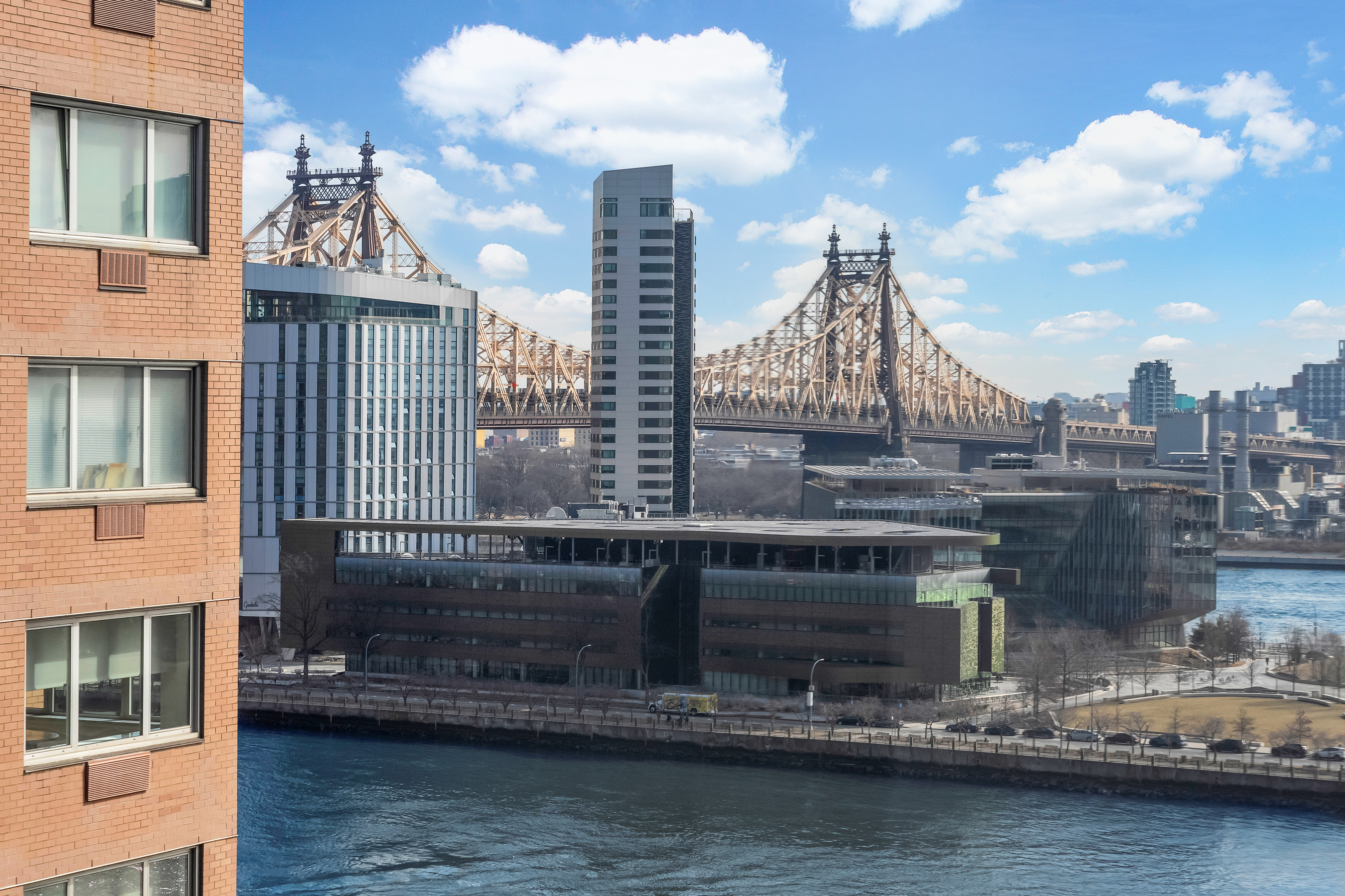 a view of a lake with a tall building