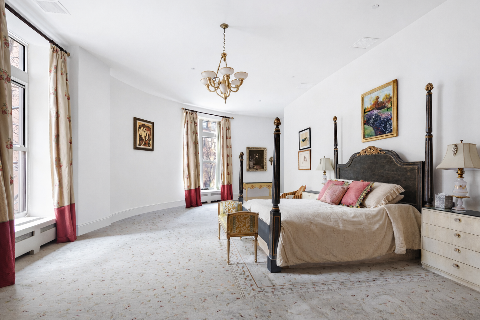 455 Central Park West, Unit 11 Manhattan, NY 10025 - Photo 6 of 18 a bedroom with furniture and a chandelier