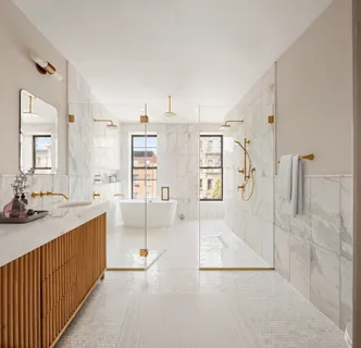 a kitchen with stainless steel appliances a refrigerator sink and stove