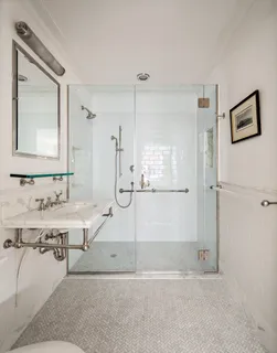 a bathroom with a bathtub and a sink