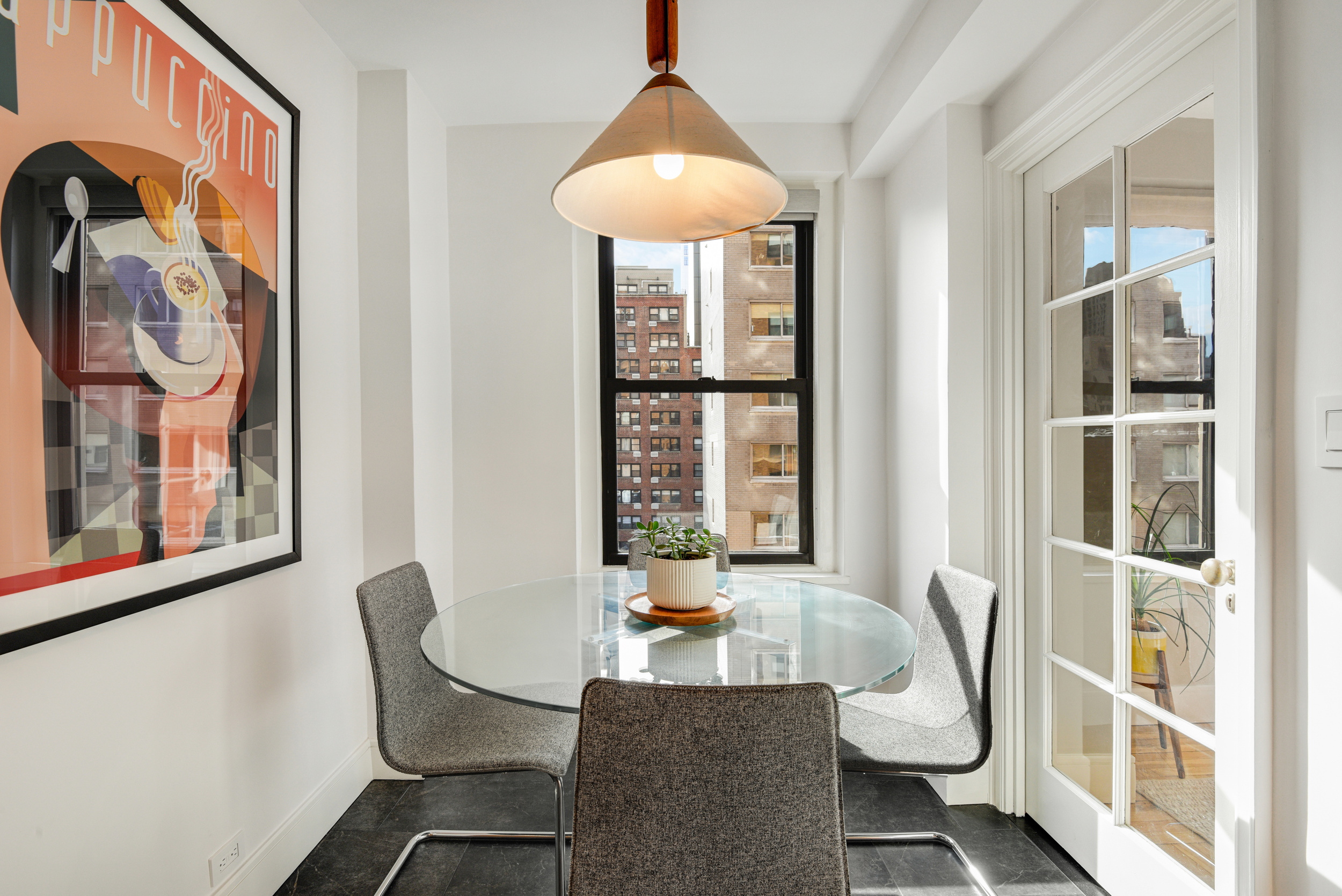 205 East 78th Street, Unit 7K Manhattan, NY 10075 - Photo 8 of 14 a living room with furniture and a window