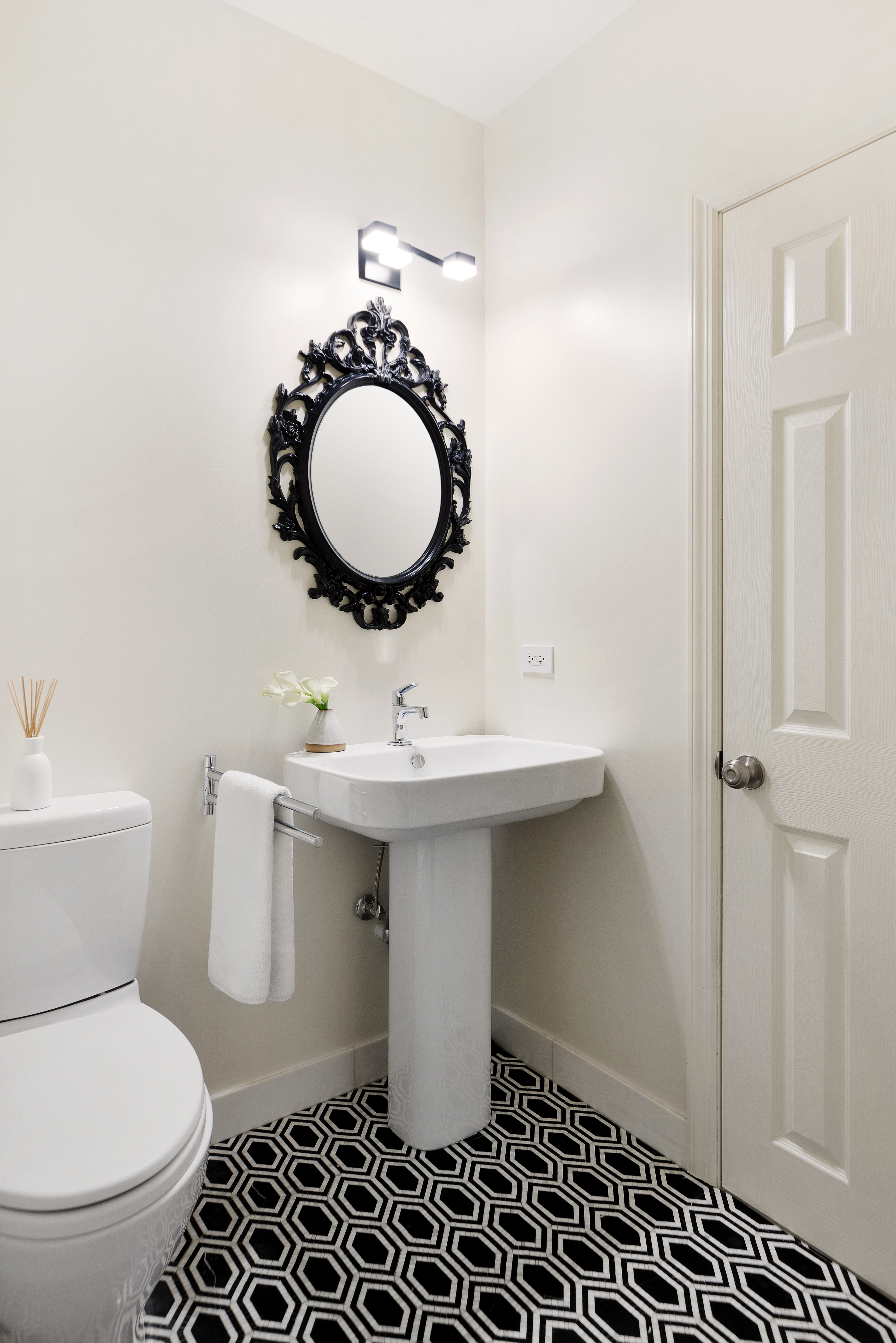 687 Greenwich Street, Unit TH7 Manhattan, NY 10014 - Photo 9 of 23 a bathroom with a sink toilet and a mirror