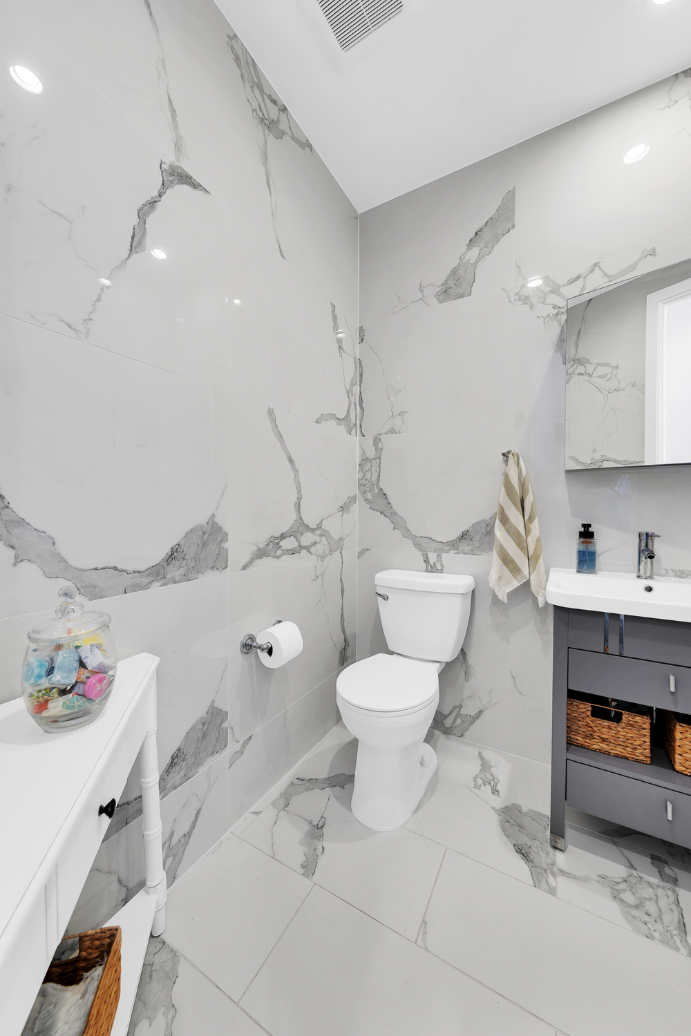 278 Nassau Avenue, Unit 4 Brooklyn, NY 11222 - Photo 11 of 17 a bathroom with a toilet sink and mirror