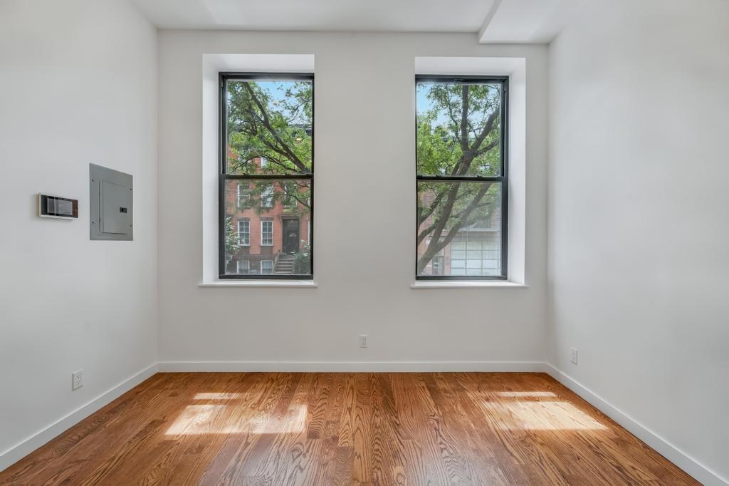 109 President Street, Unit 2 Brooklyn, NY 11231 - Photo 9 of 20 a view of a room that has a window in it