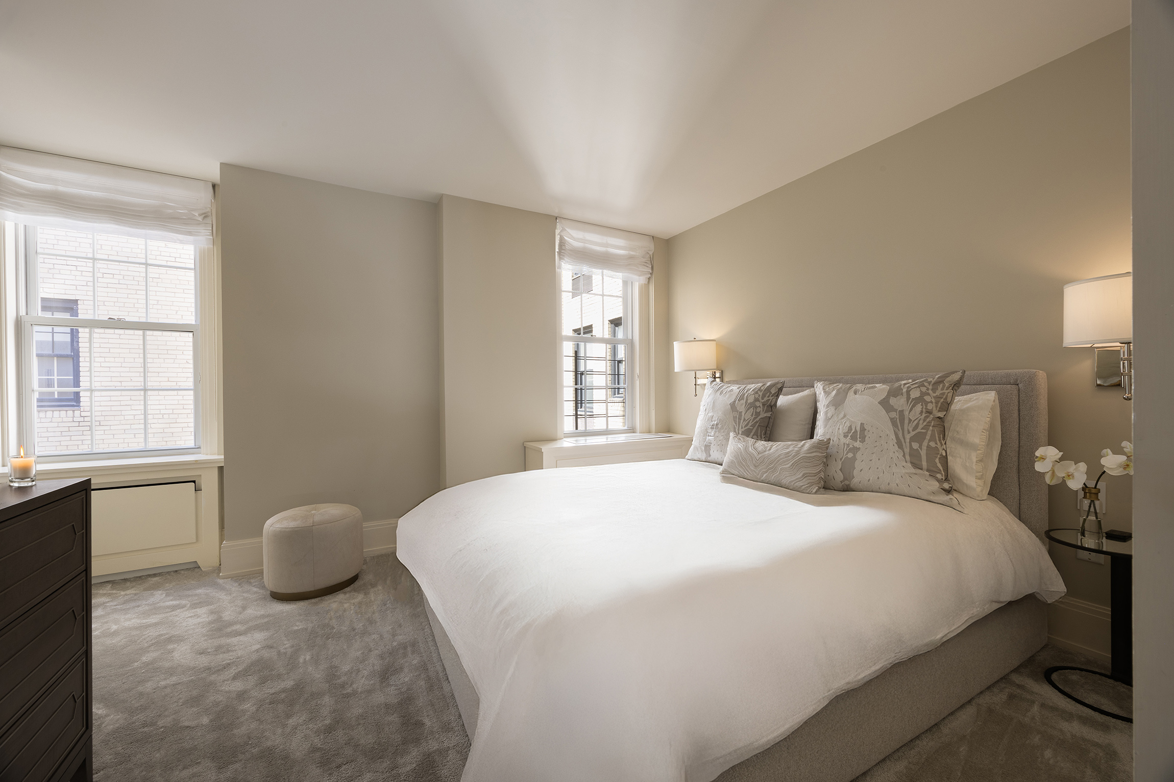 40 East 66th Street, Unit 9A Manhattan, NY 10065 - Photo 11 of 14 a bedroom with a bed and window