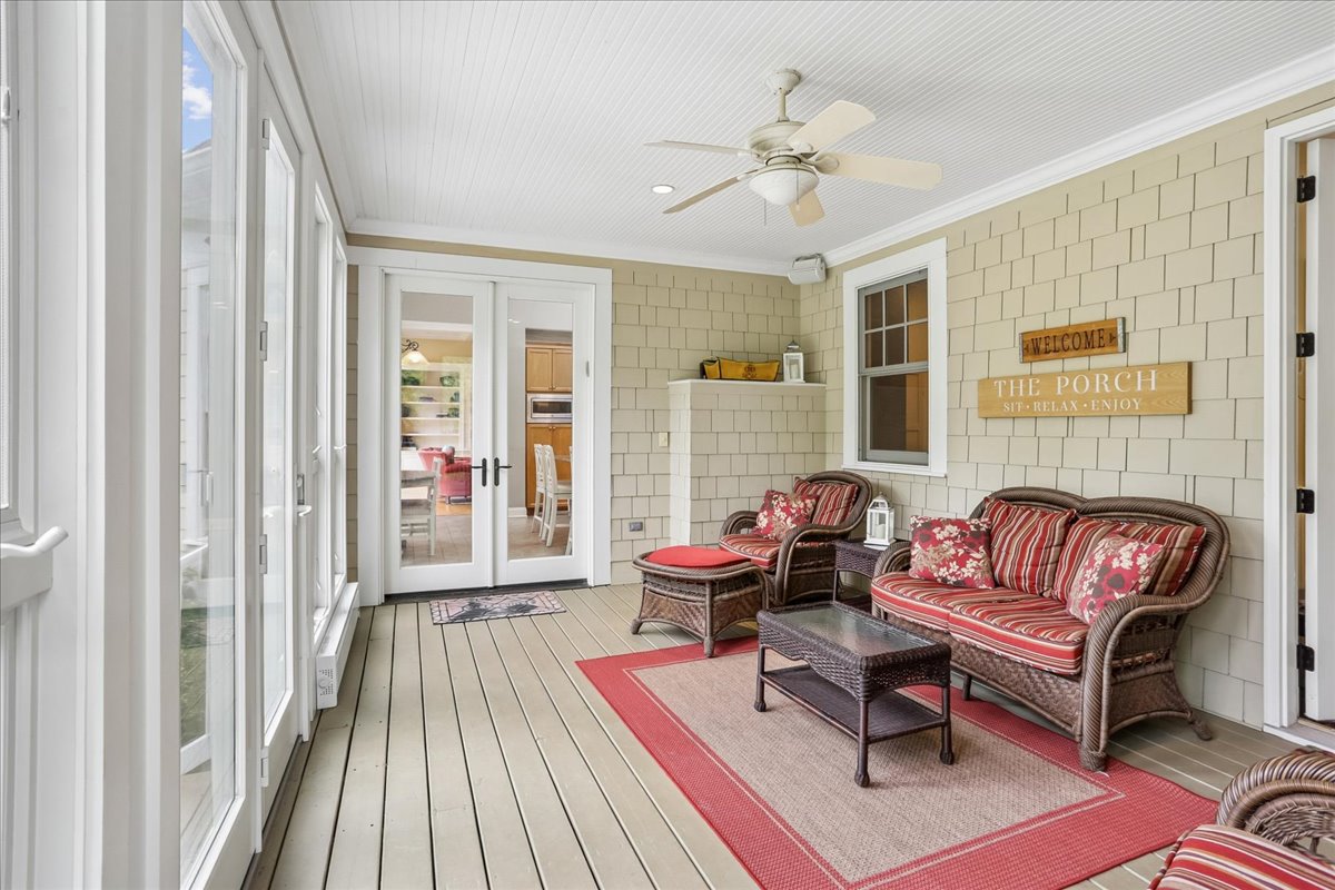 11736 Gainsborough Road Potomac, MD 20854 - Photo 45 of 90 a living room with furniture and a fireplace