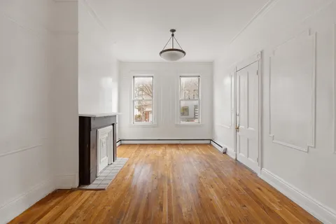 a kitchen with granite countertop a stove and a sink