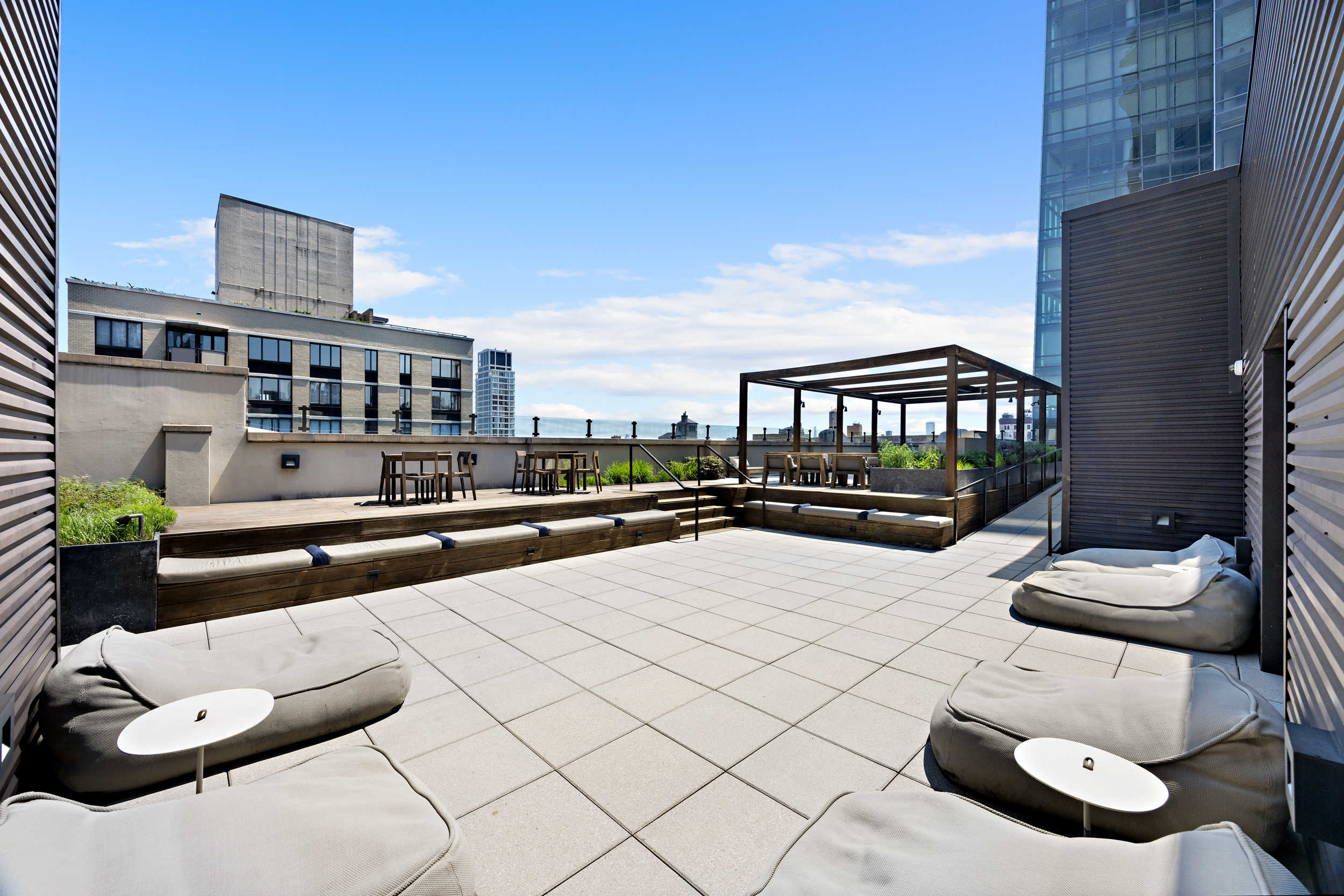 404 Park Avenue South, Unit 3E Manhattan, NY 10016 - Photo 18 of 21 a view of swimming pool with outdoor seating and city view