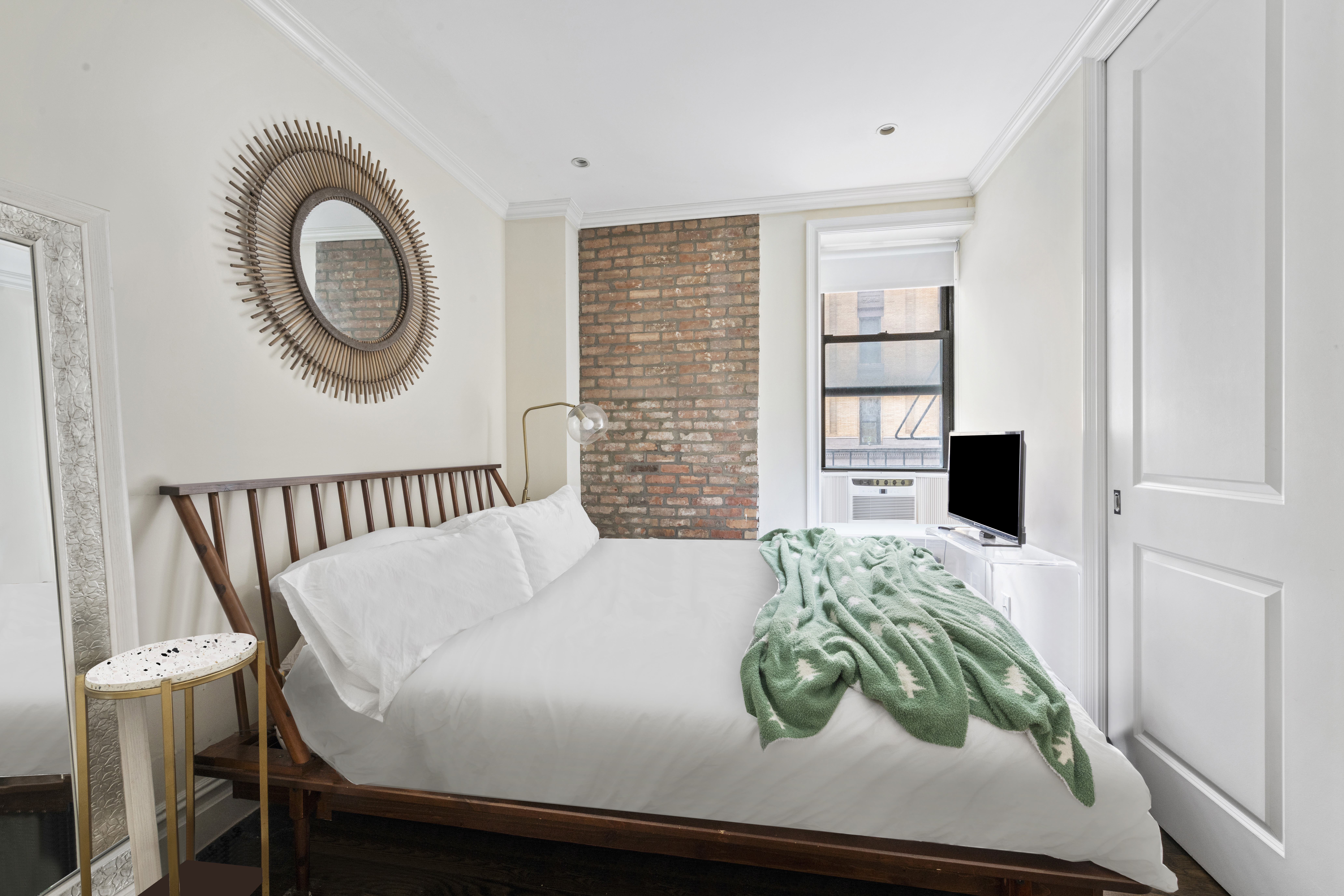 170 West 83rd Street, Unit 2W Manhattan, NY 10024 - Photo 5 of 10 a bedroom with a bed and a window