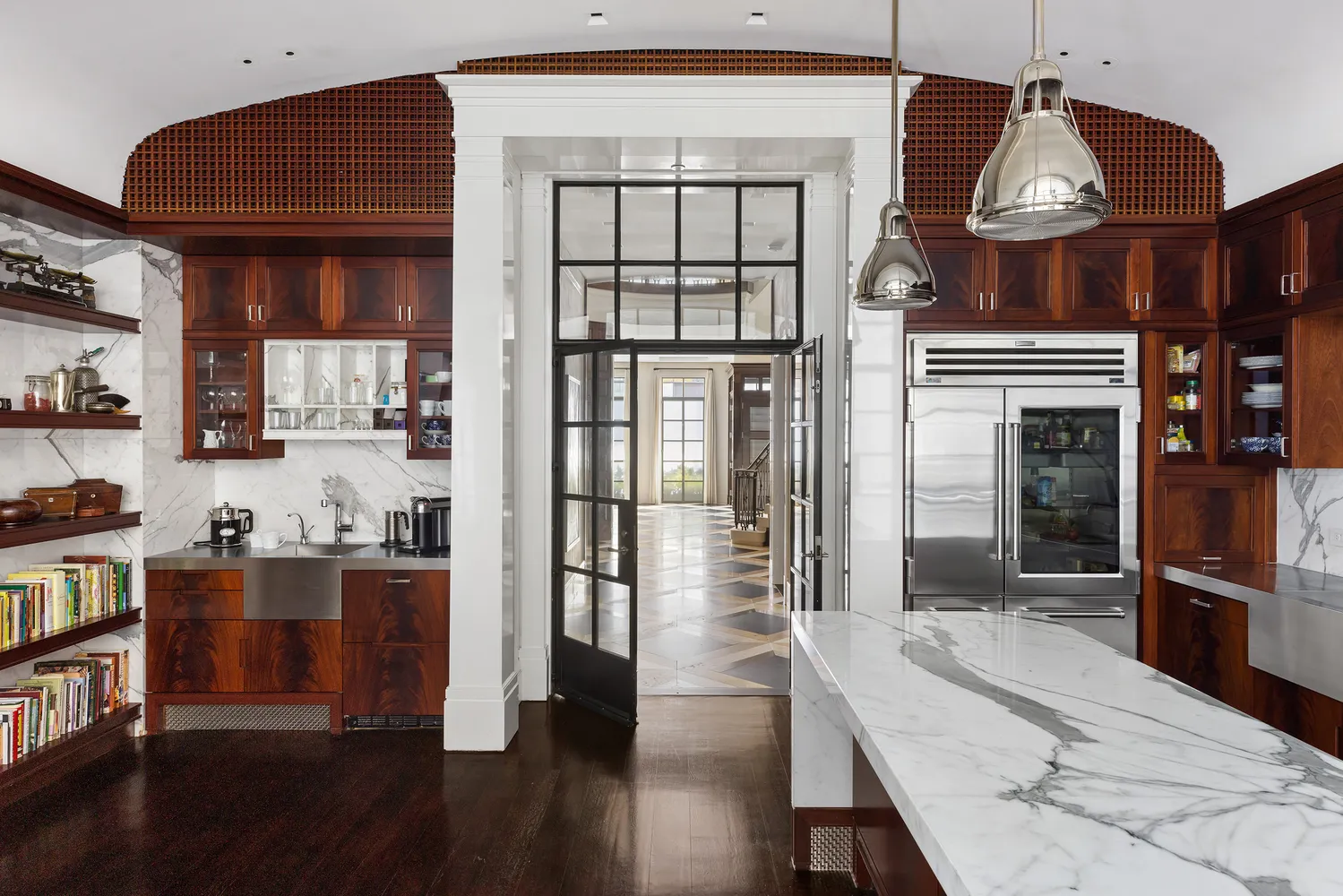a kitchen with stainless steel appliances granite countertop a stove and cabinets