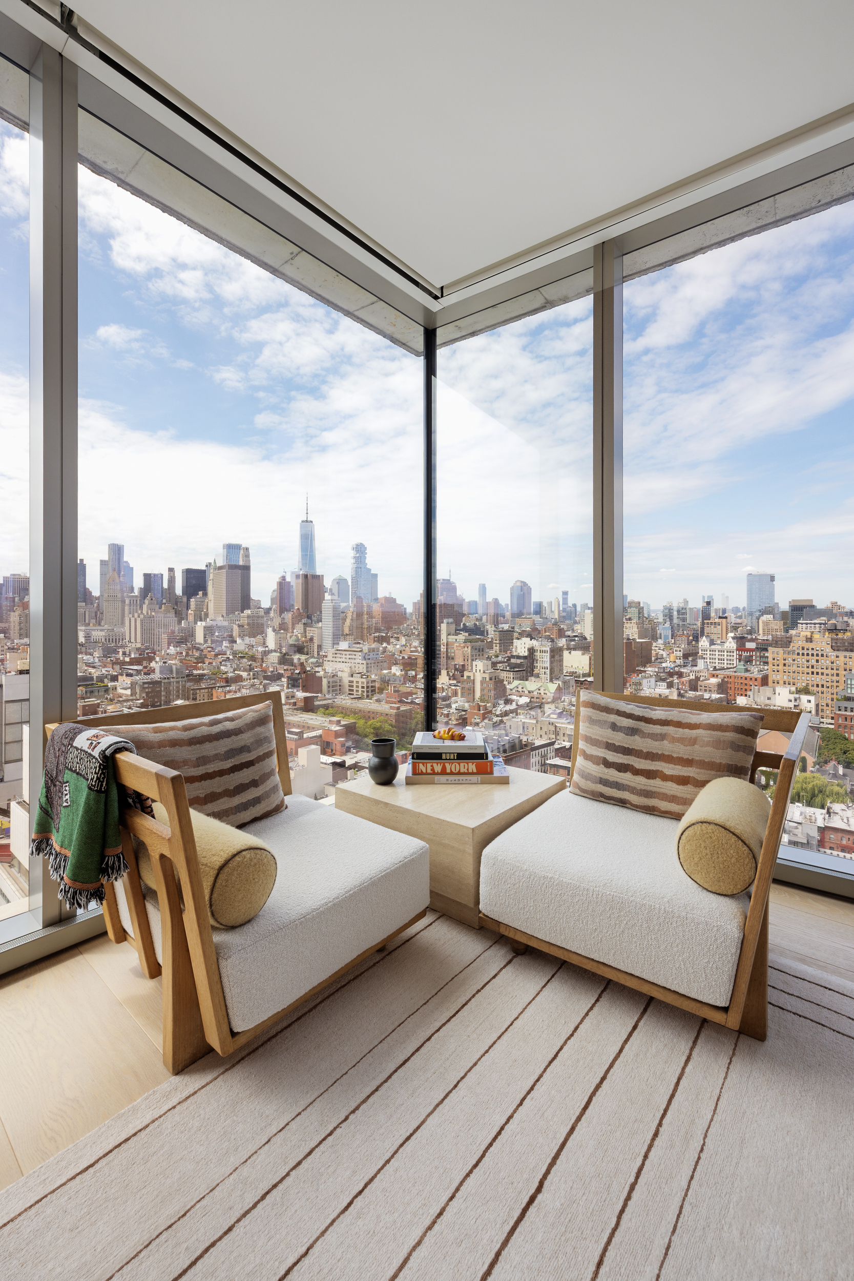215 Chrystie Street, Unit 29W Manhattan, NY 10002 - Photo 4 of 24 a very nice looking living room with a couch and a large window