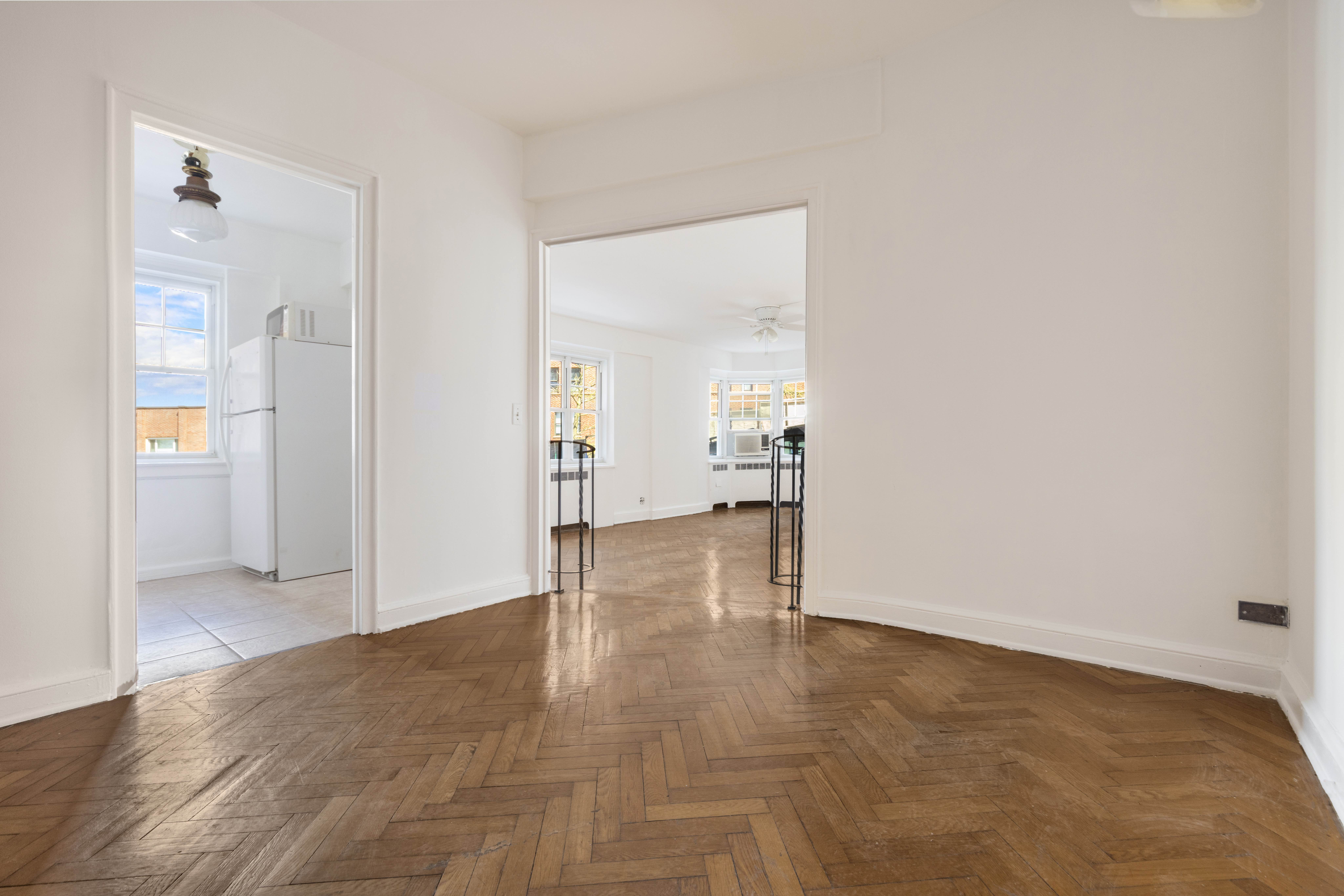 200 Cabrini Boulevard, Unit 17 Manhattan, NY 10033 - Photo 5 of 24 a view of empty room with wooden floor