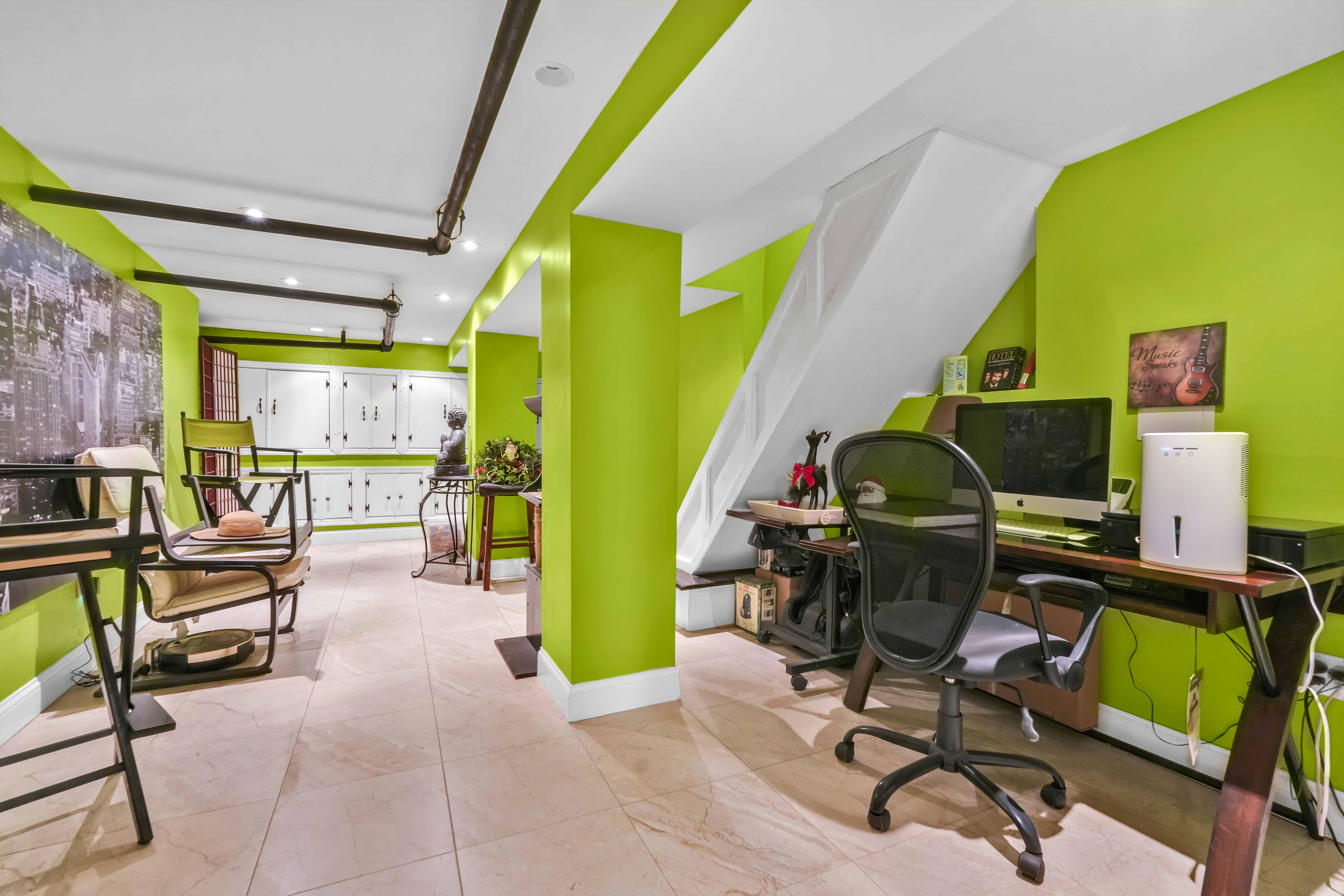 519 Monroe Street Brooklyn, NY 11221 - Photo 50 of 55 a view of a workspace with furniture and a potted plant