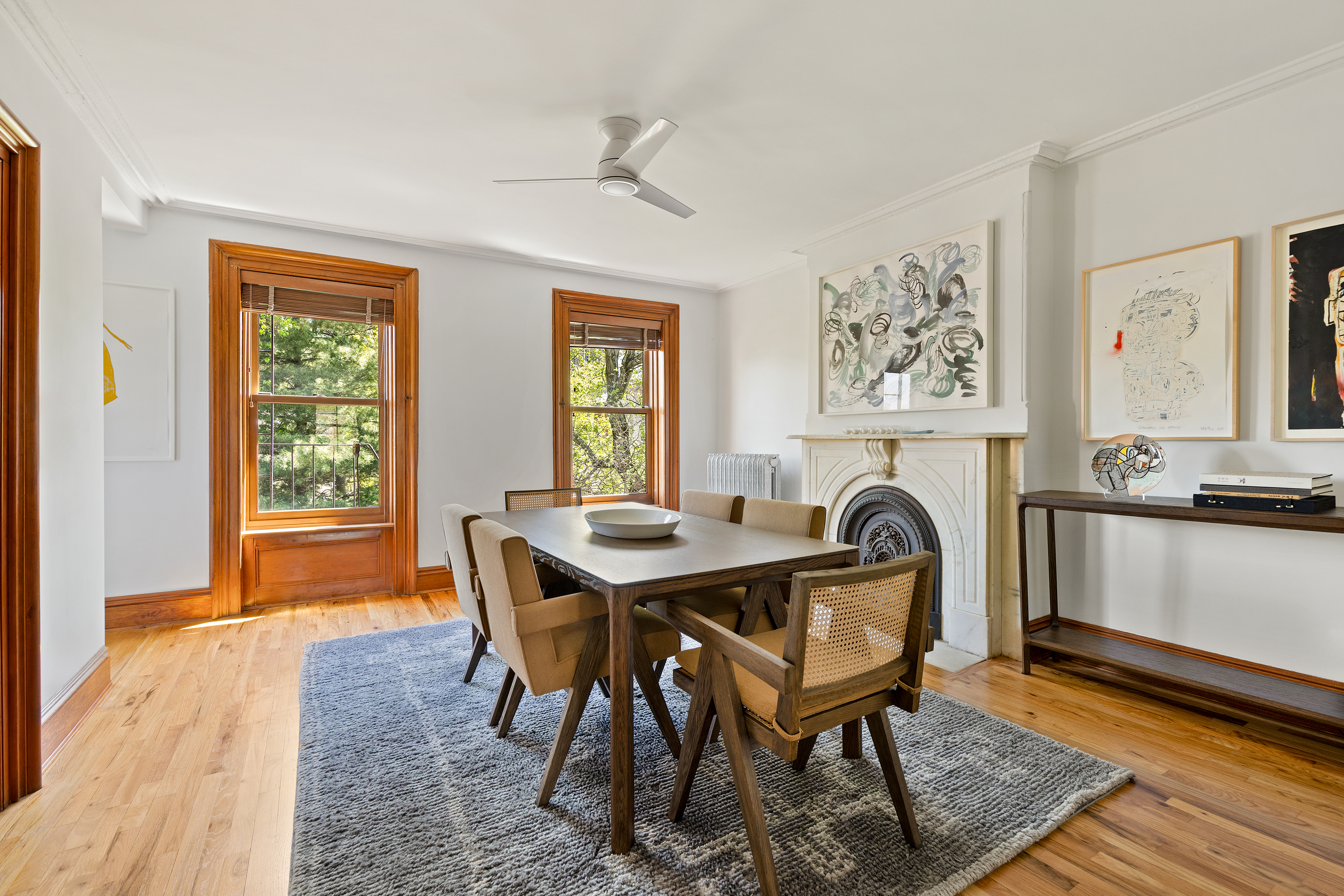 315 Adelphi Street Brooklyn, NY 11205 - Photo 26 of 31 a view of a dining room with furniture window and wooden floor