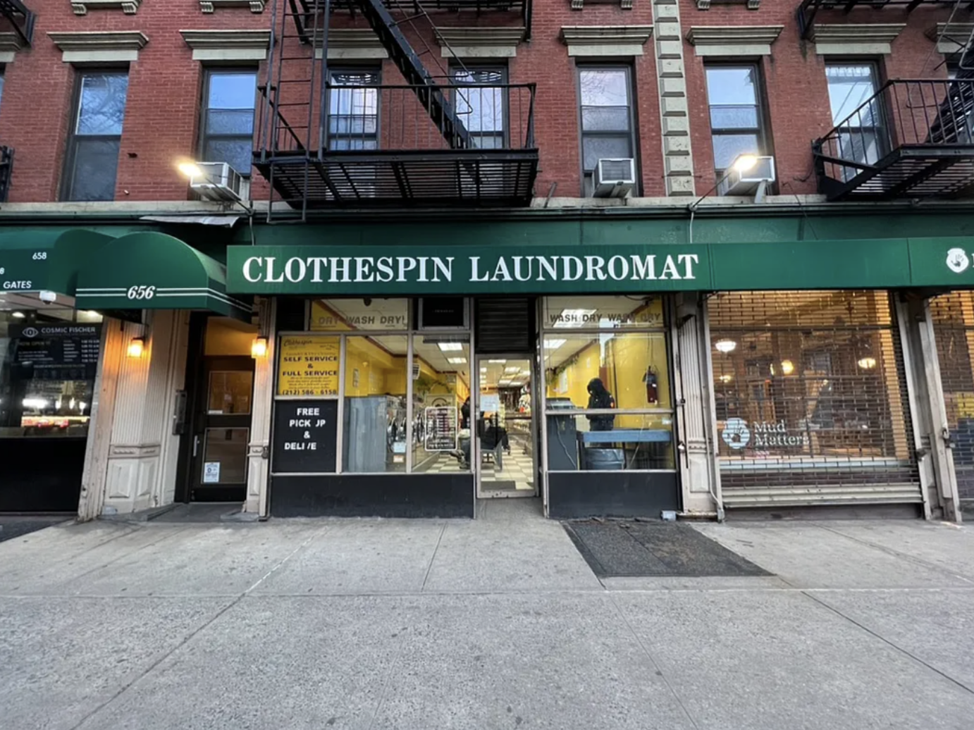 451 West 44th Street, Unit 36 Manhattan, NY 10036 - Photo 13 of 18 a view of a building with sitting area and garage