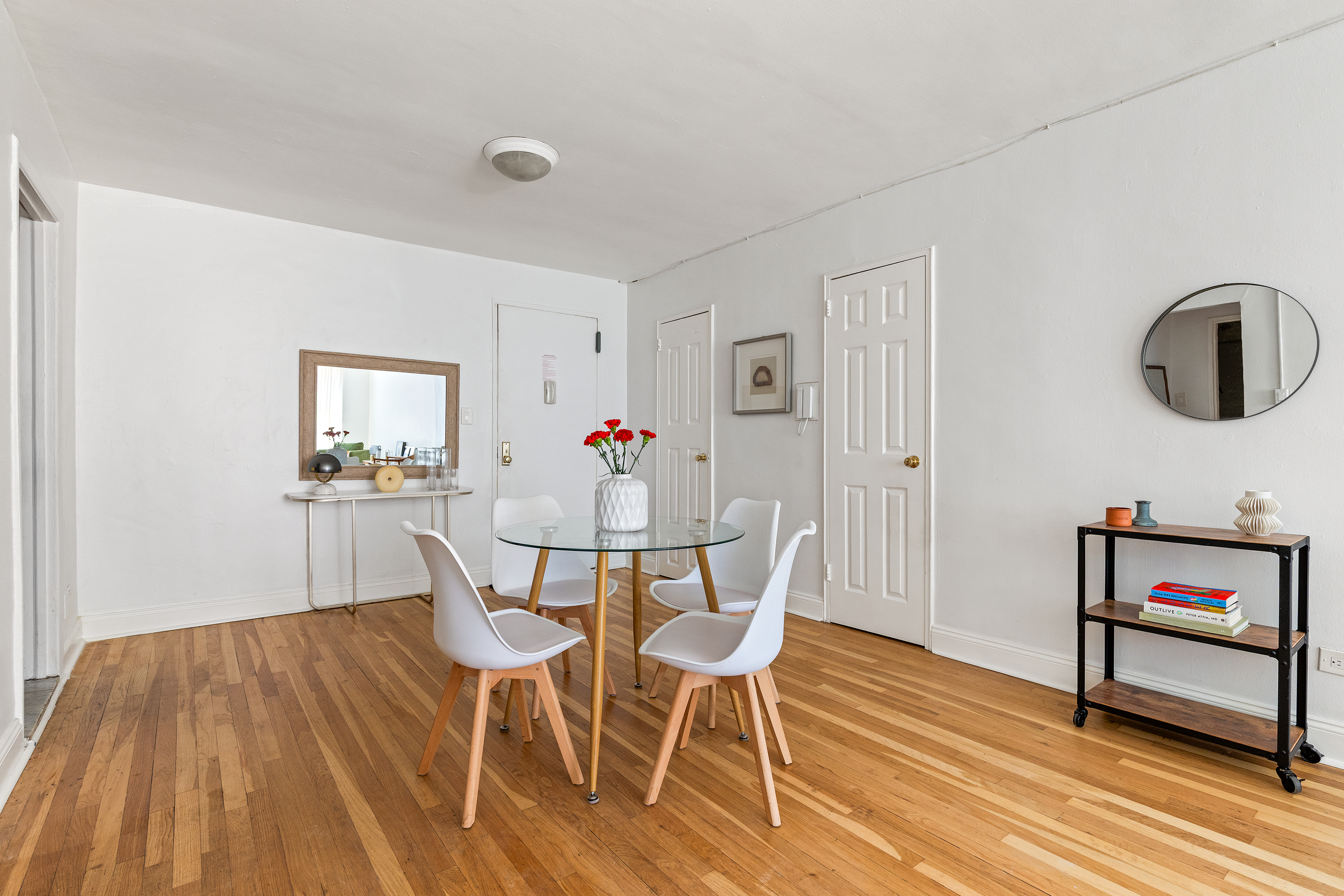 310 Lenox Road, Unit 4J Brooklyn, NY 11226 - Photo 2 of 6 a view of a dining room with furniture and wooden floor