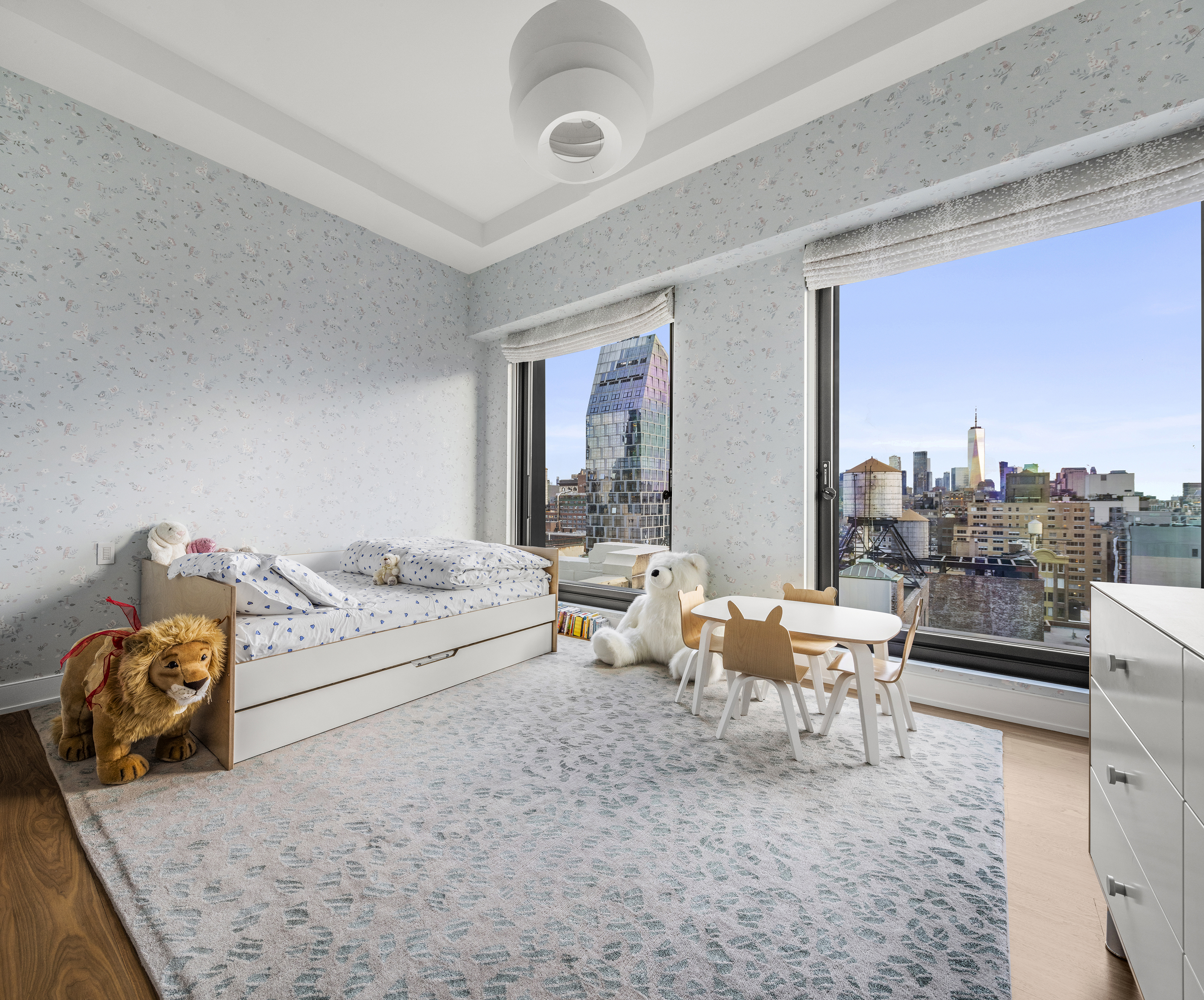 55 West 17th Street, Unit PH Manhattan, NY 10011 - Photo 17 of 36 a living room with furniture and a table