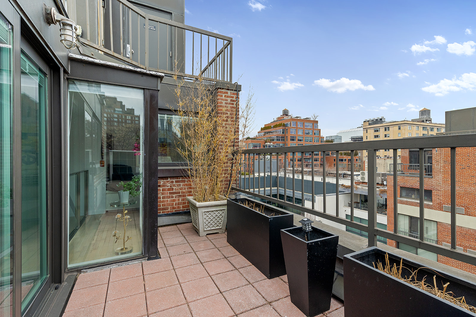 357 West 12th Street, Unit 5E Manhattan, NY 10014 - Photo 12 of 13 a view of a balcony with chairs