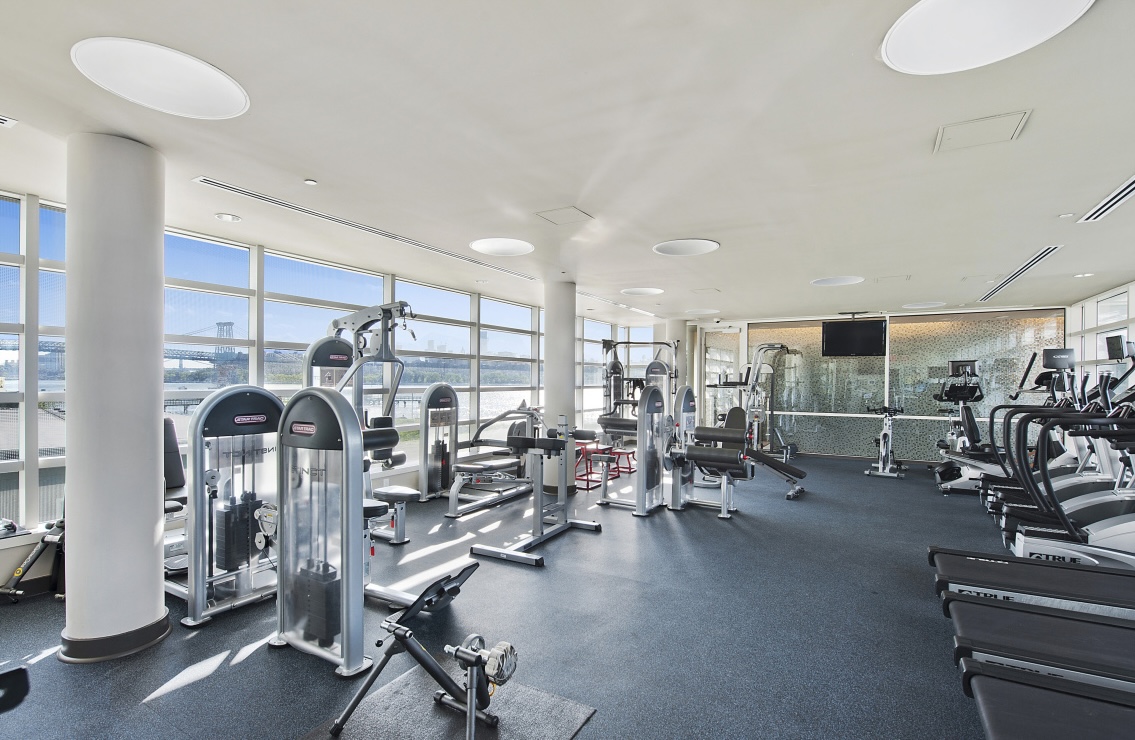 2 Northside Piers, Unit 30Y Brooklyn, NY 11249 - Photo 13 of 22 a view of a room with gym equipment