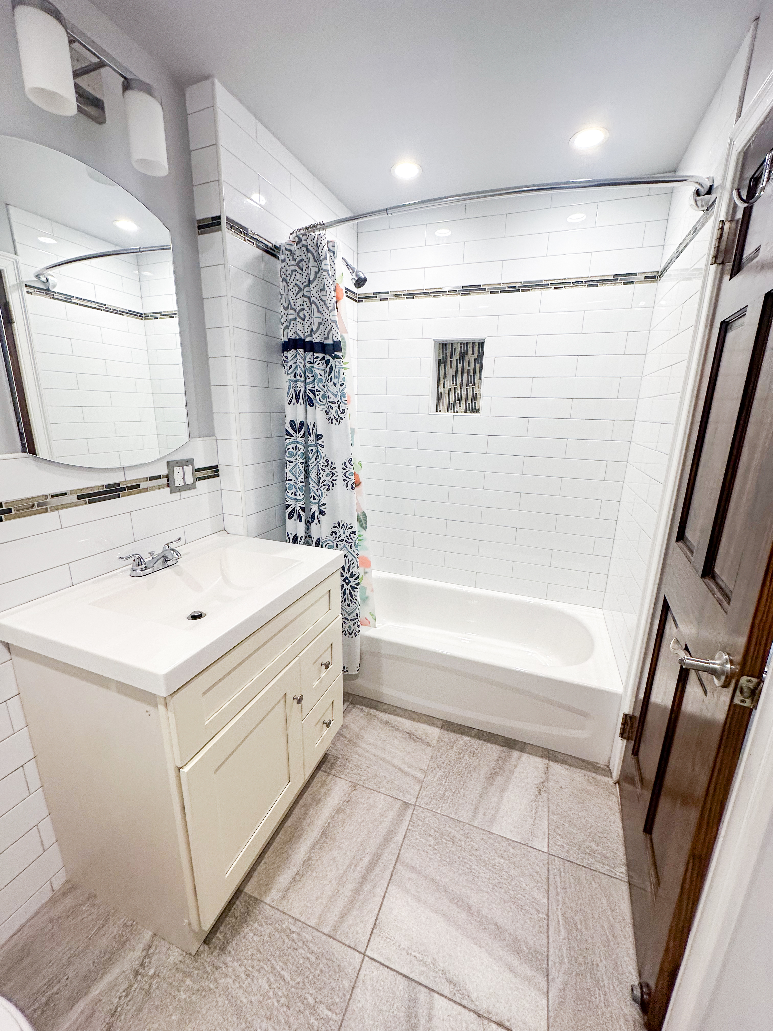 567 New Jersey Avenue, Unit 2 Brooklyn, NY 11207 - Photo 10 of 11 a bathroom with a sink a toilet and a bathtub
