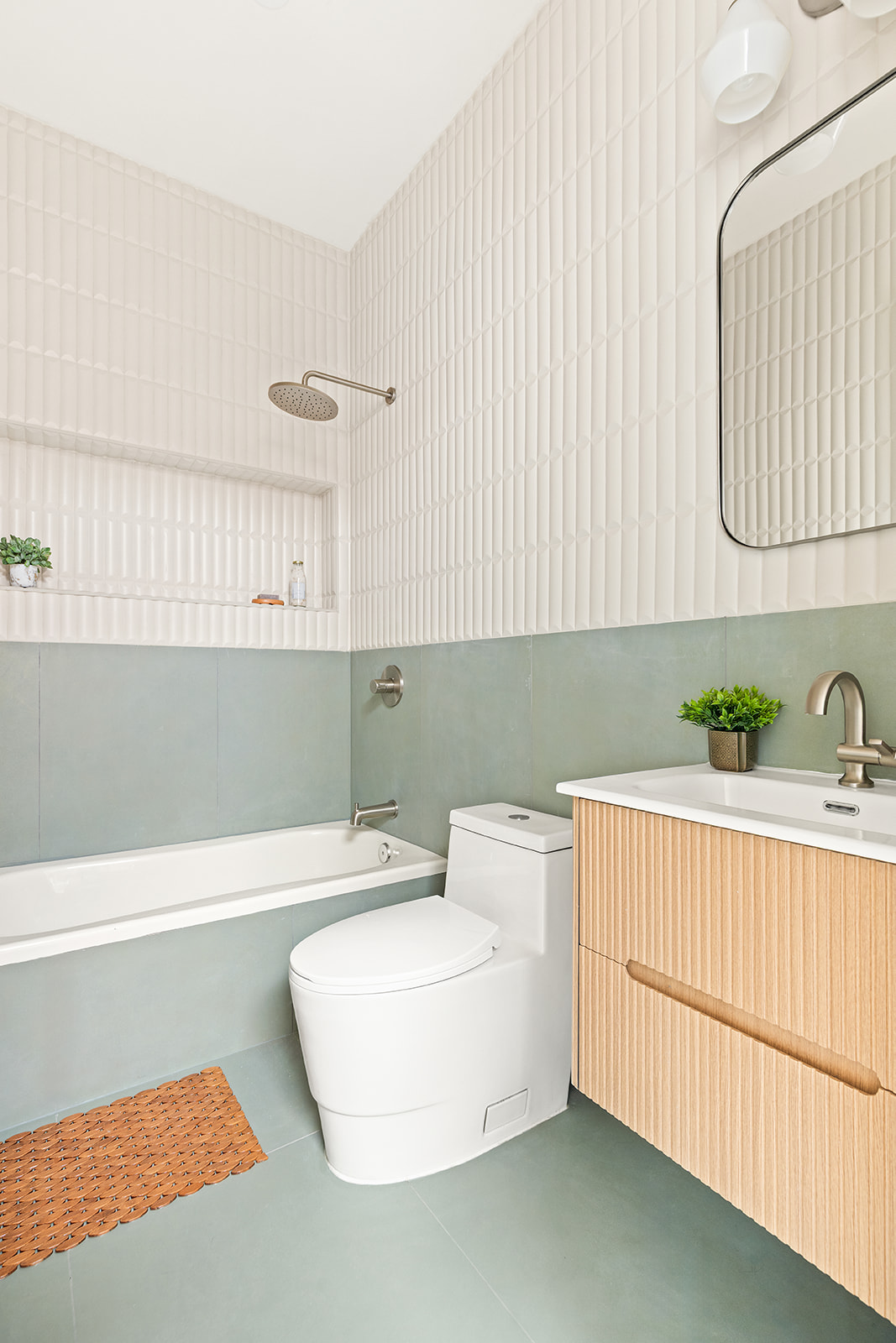 966 St Johns Place Brooklyn, NY 11213 - Photo 16 of 20 a bathroom with a sink and a bathtub