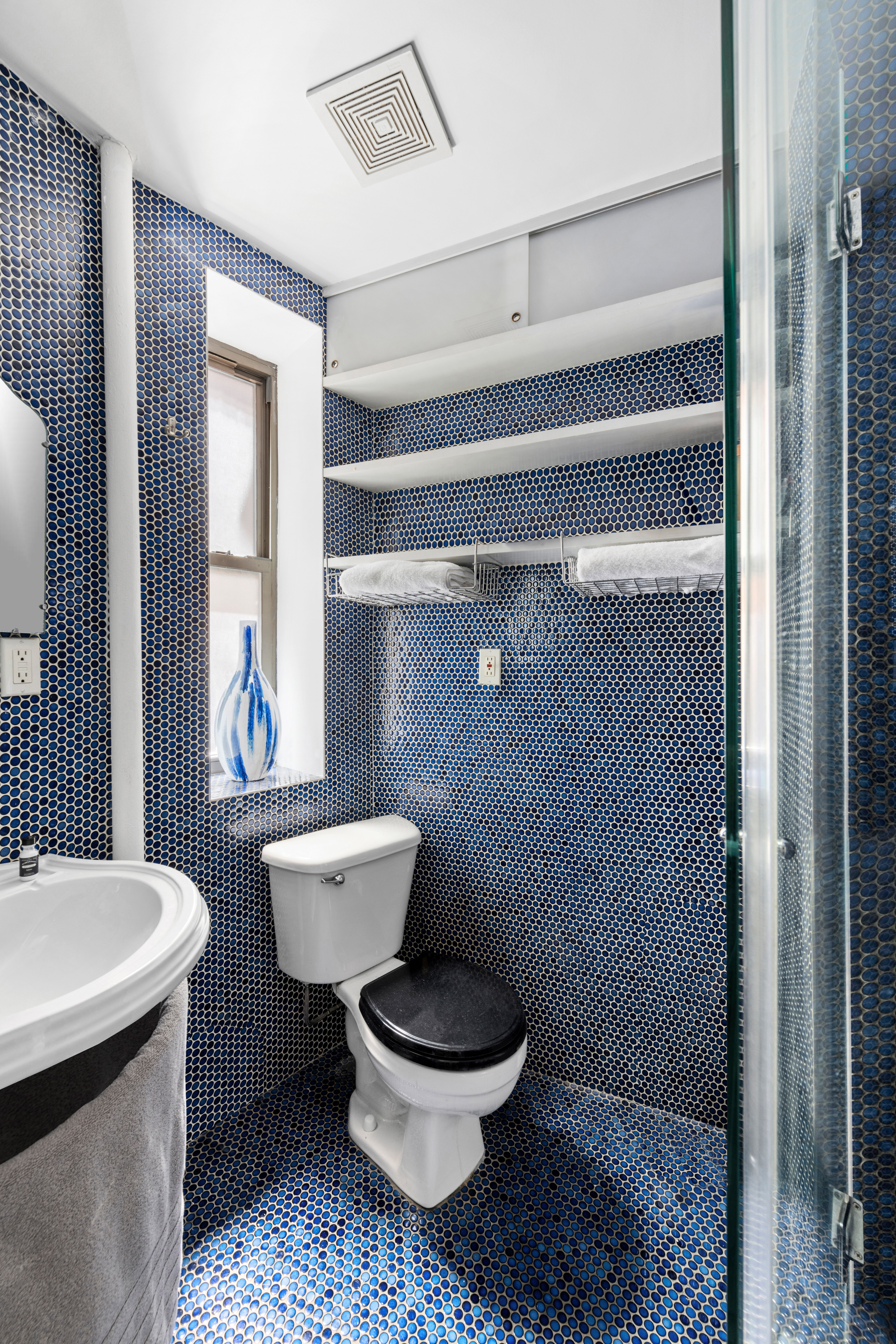 321 East 12th Street, Unit 24 Manhattan, NY 10003 - Photo 7 of 8 a bathroom with a toilet and a sink