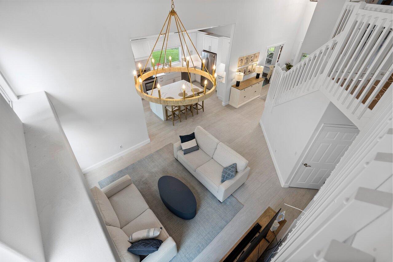 1182 Canoe Point Delray Beach, FL 33444 - Photo 21 of 46 a view of living room with furniture and a fireplace