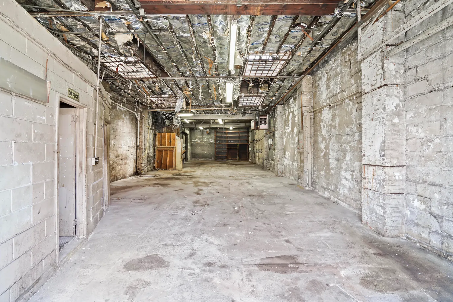 a view of a big room with a fireplace