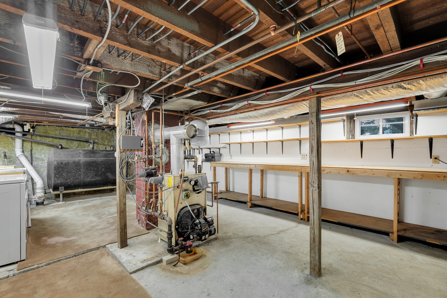 242-09 Pine Street Queens, NY 11363 - Photo 14 of 21 a view of a room with racks