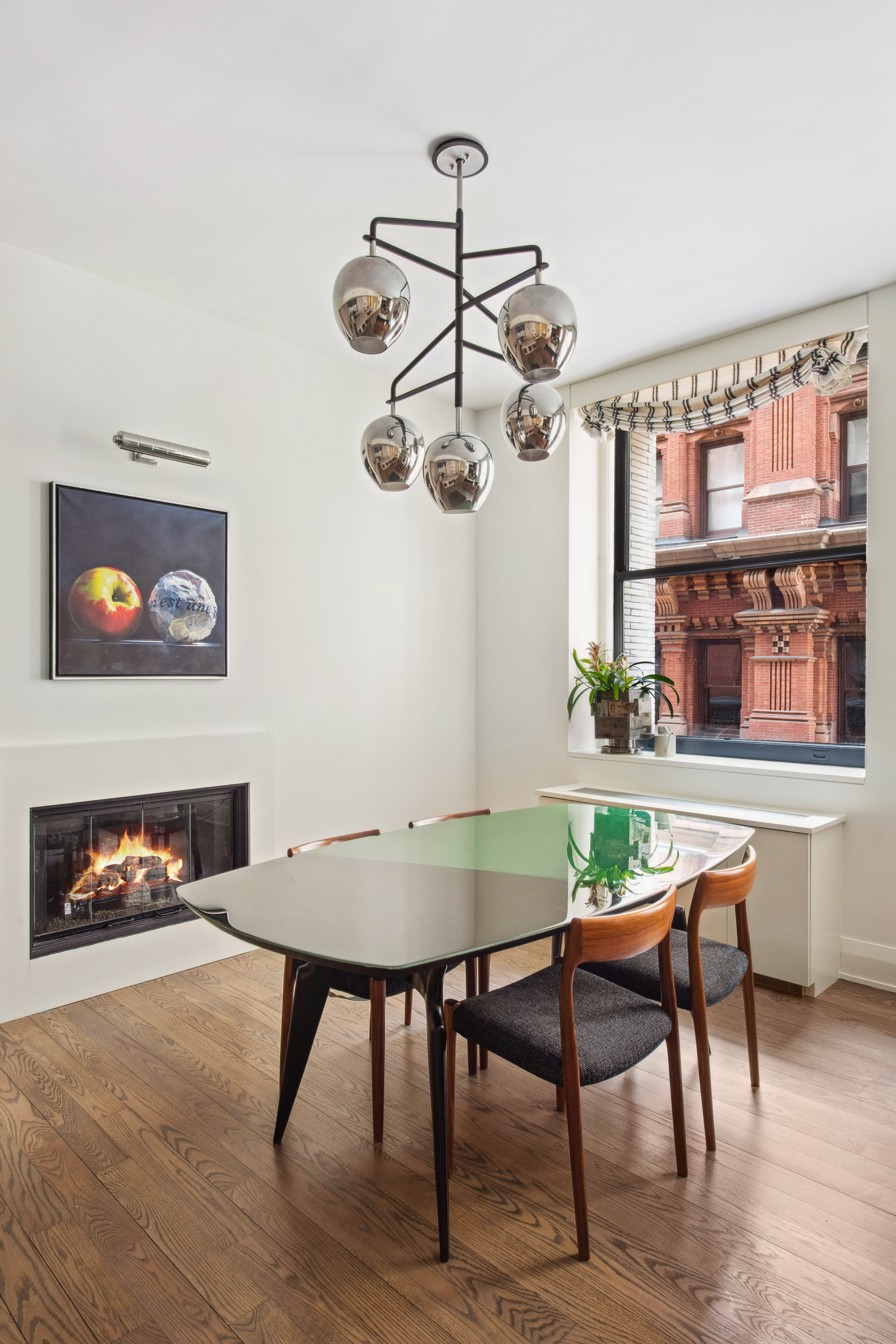 150 Nassau Street, Unit 10A Manhattan, NY 10038 - Photo 4 of 20 a living room with furniture and a fireplace