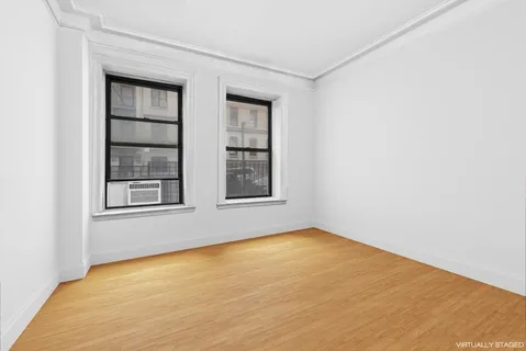 a view of empty room with windows