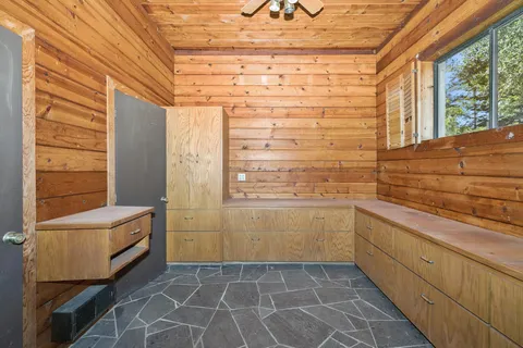 a bathroom with a bathtub and shower