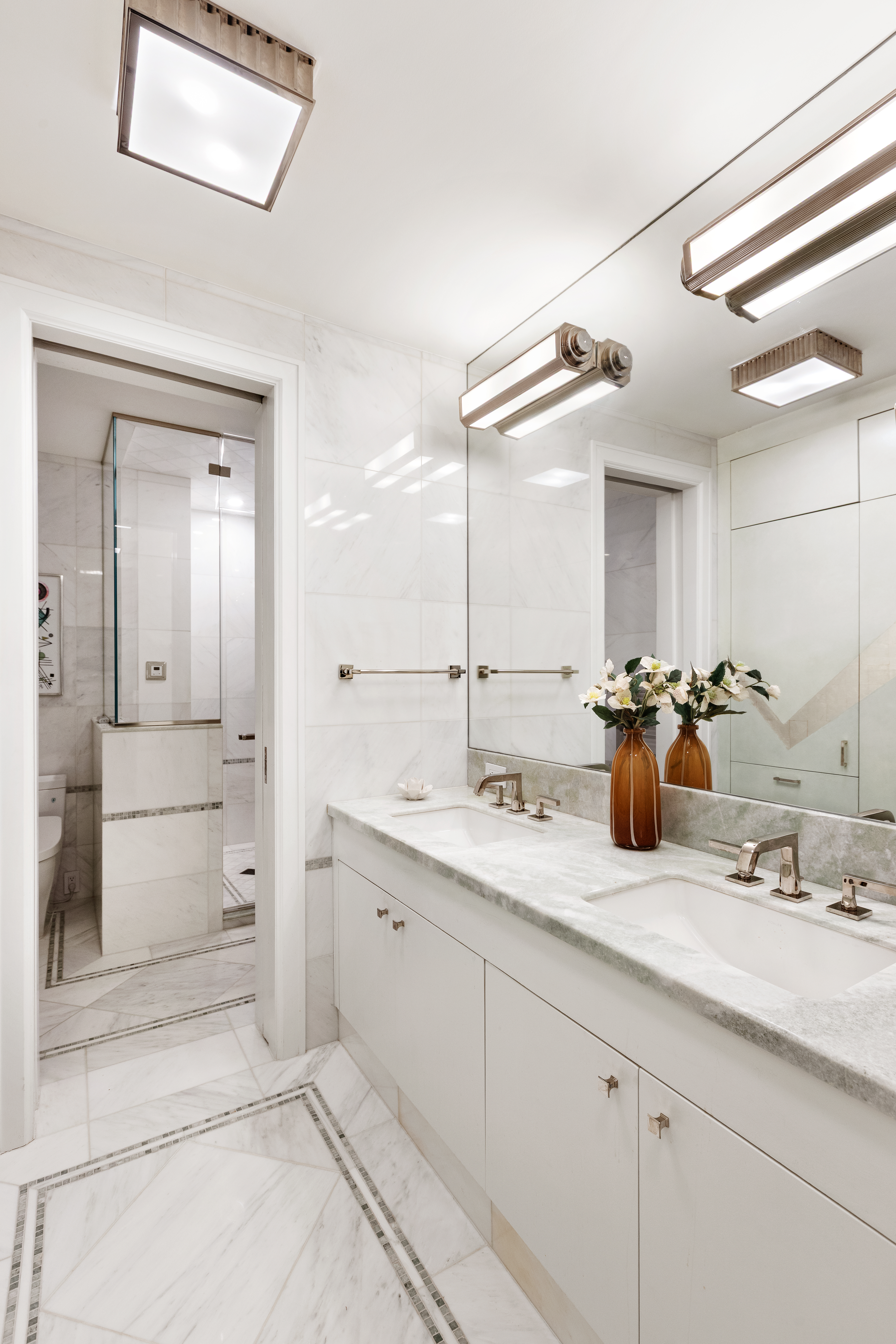 623 2nd Street Brooklyn, NY 11215 - Photo 13 of 26 a bathroom with a sink and a mirror