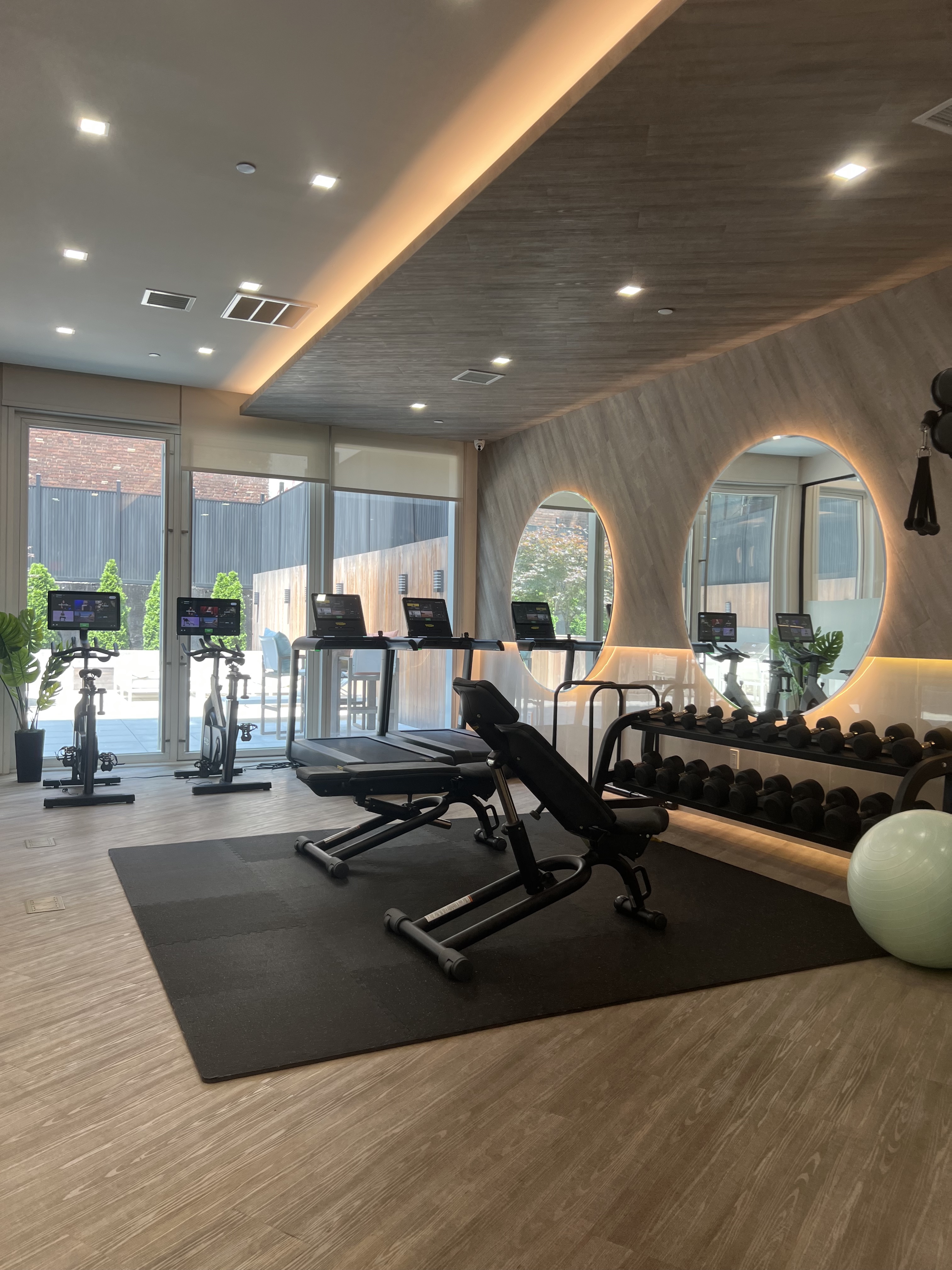 37-34 33rd Street, Unit 7H Queens, NY 11101 - Photo 14 of 18 a living room with lots of furniture and a large window