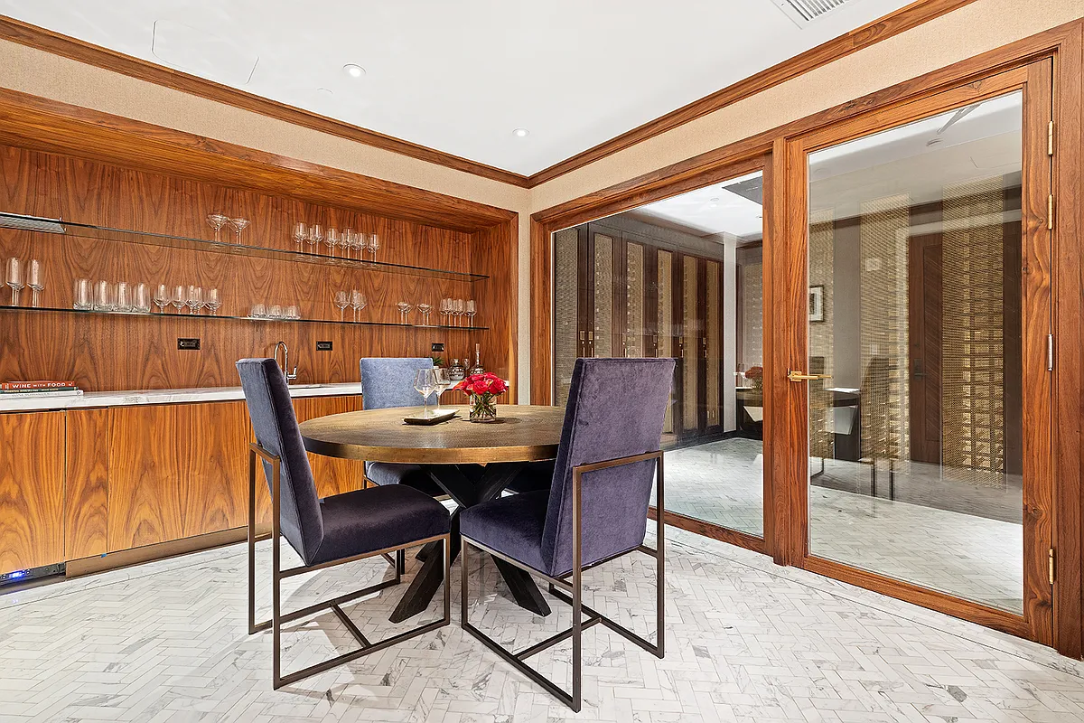 100 Barclay Street, Unit 21AD Manhattan, NY 10007 - Photo 30 of 37 a dining room with furniture and a floor to ceiling window