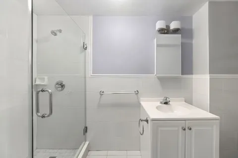 a bathroom with a sink and mirror