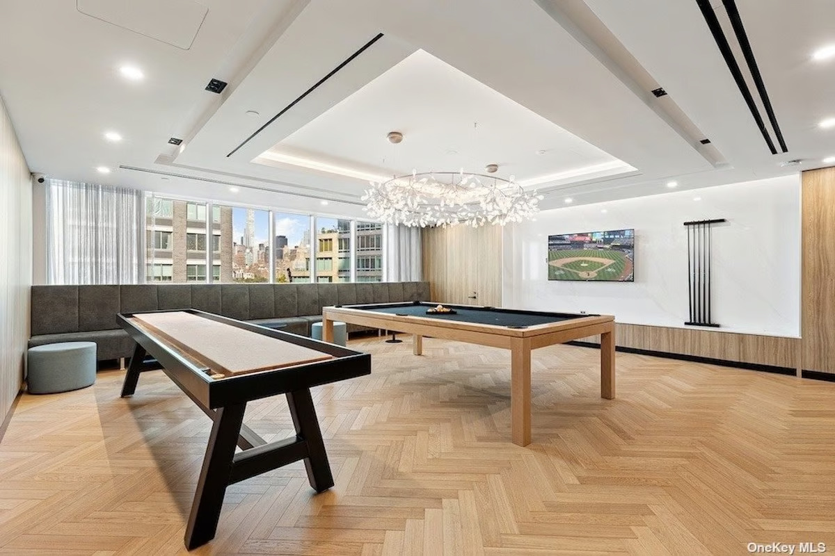 46-30 Center Boulevard, Unit PH8 Queens, NY 11109 - Photo 29 of 32 a room with furniture pool table and windows