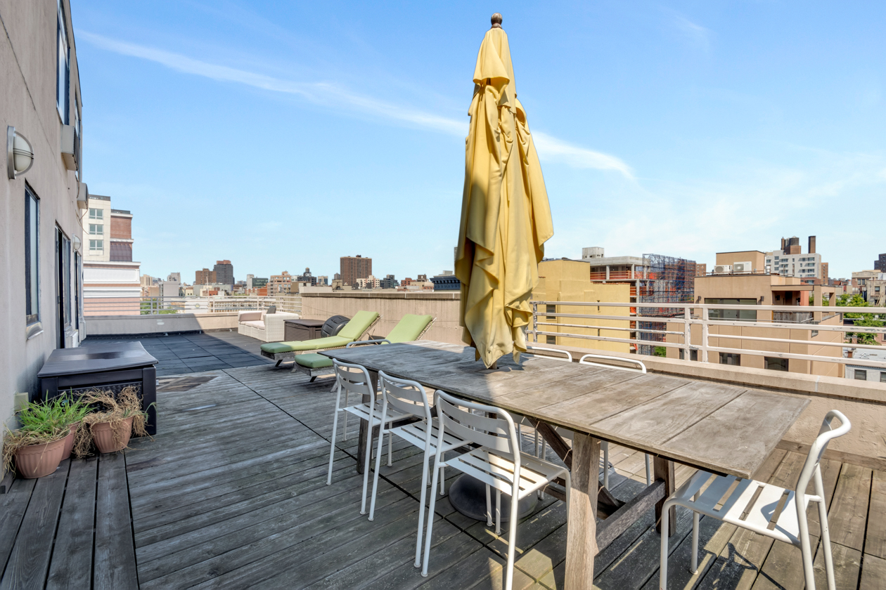 416 East 117th Street, Unit PH6 Manhattan, NY 10035 - Photo 2 of 18 a view of a terrace with chairs