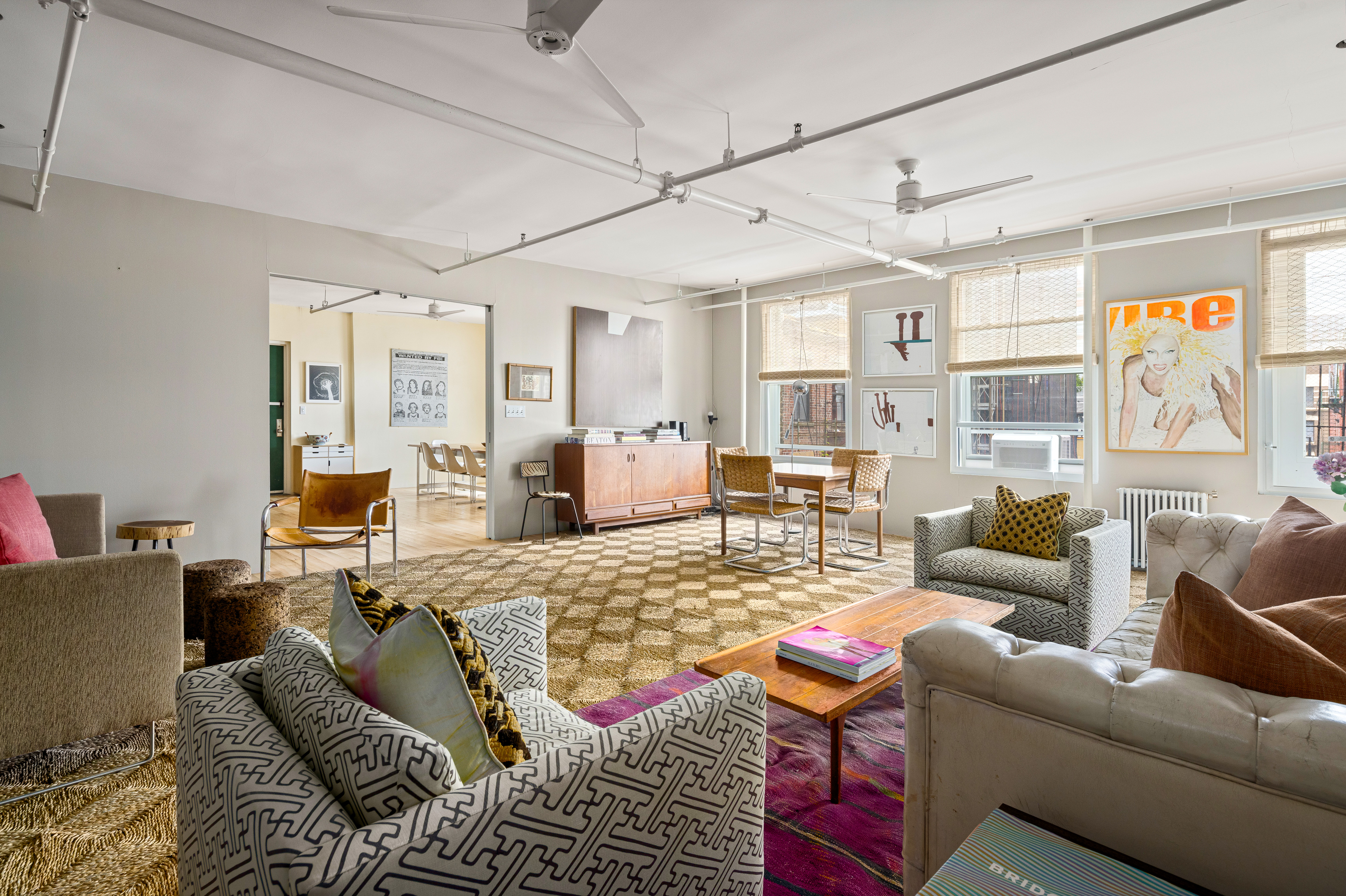 191 Chrystie Street, Unit 5R Manhattan, NY 10002 - Photo 2 of 16 a living room with furniture kitchen and a window