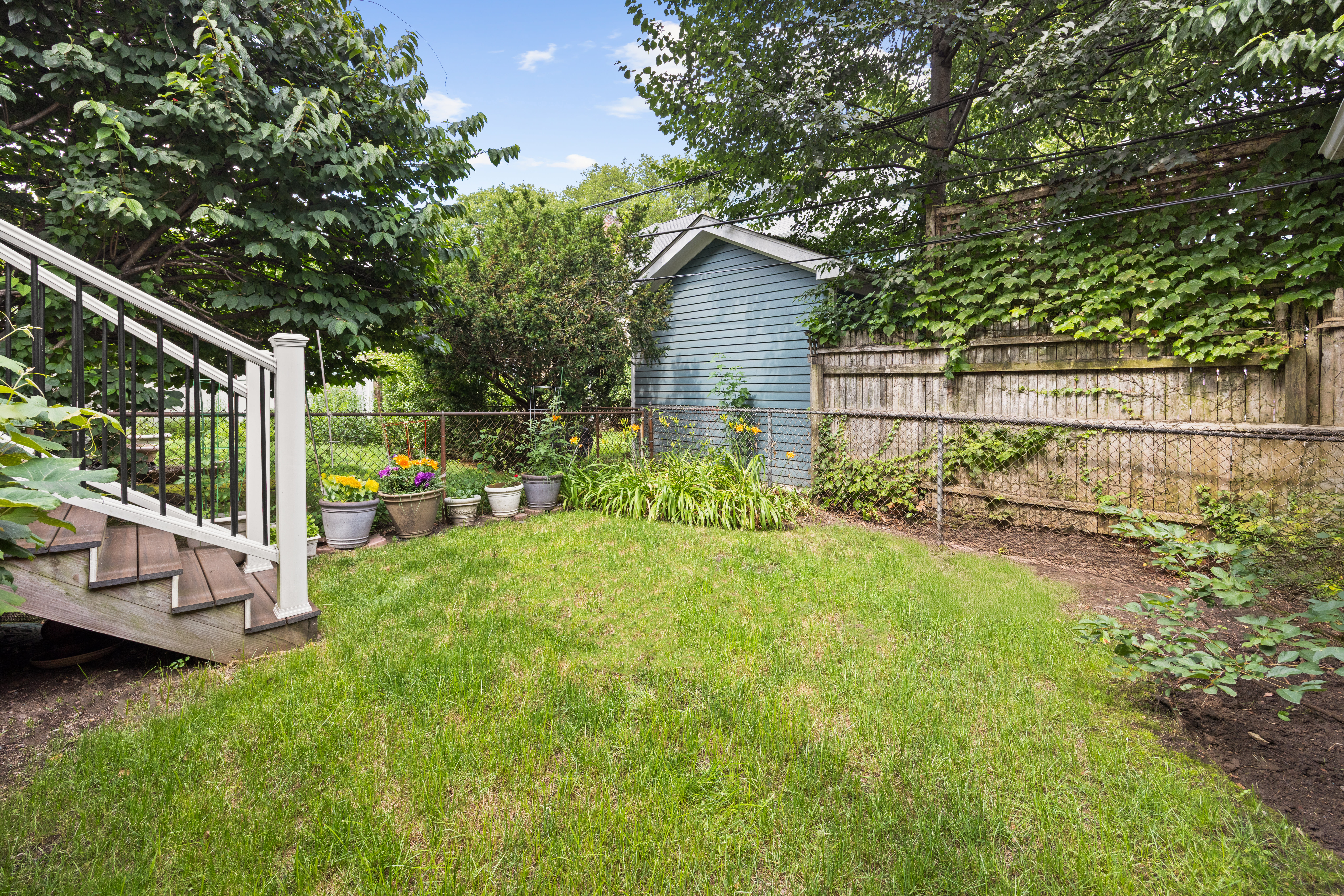 481 Stratford Road Brooklyn, NY 11218 - Photo 11 of 25 a view of backyard with plants and trees