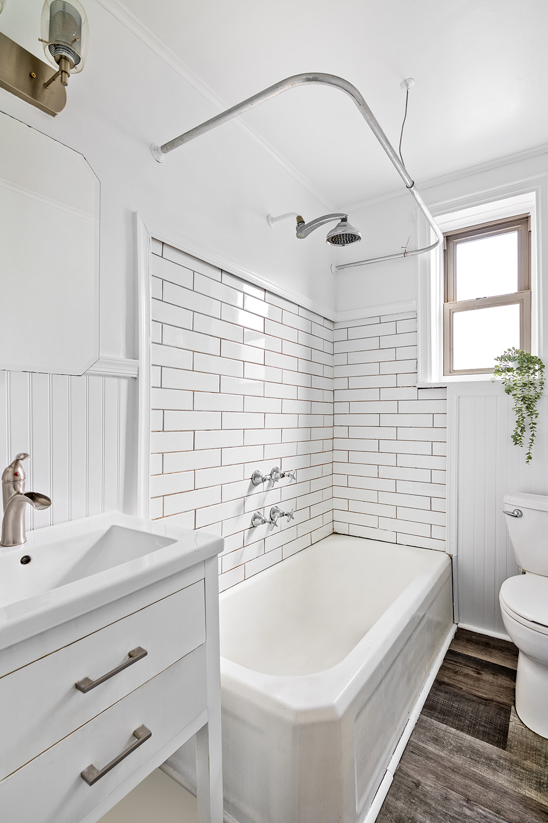 48-19 43rd Street, Unit 4A Queens, NY 11377 - Photo 5 of 8 a bathroom with a bathtub and a sink
