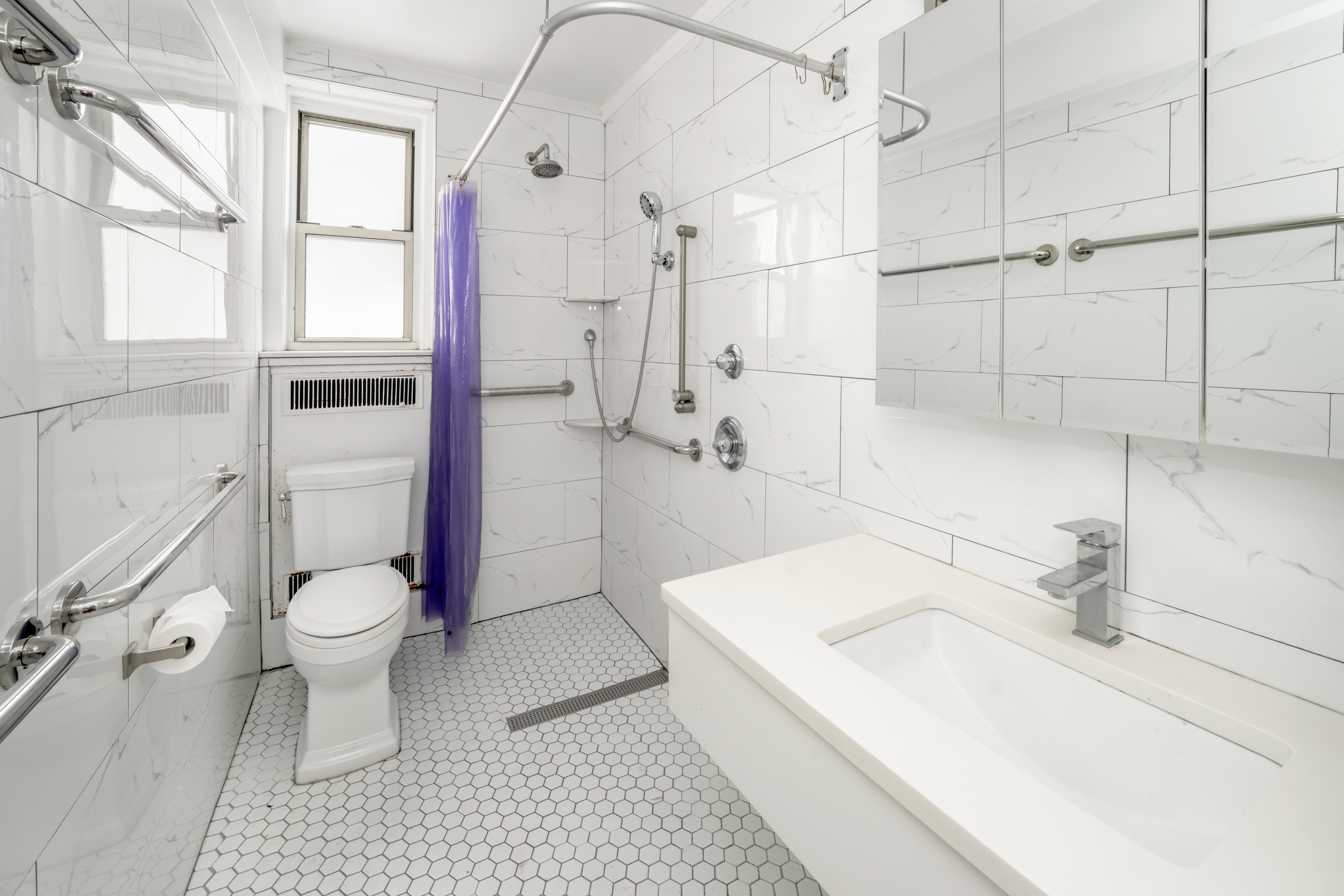 44 Gramercy Park North, Unit 5F Manhattan, NY 10010 - Photo 9 of 10 a bathroom with a sink toilet and shower