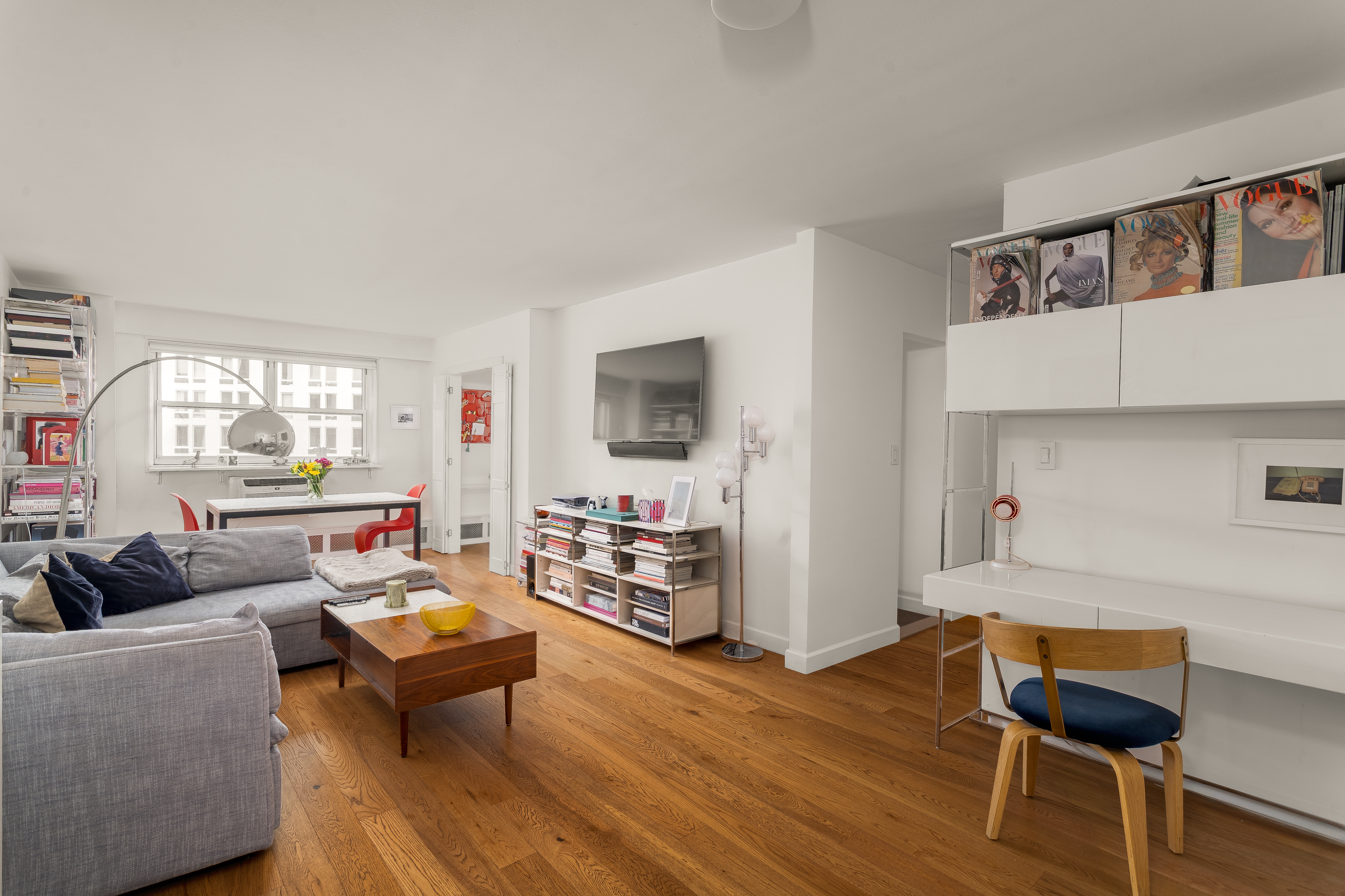 191 Willoughby Street, Unit 12J Brooklyn, NY 11201 - Photo 3 of 19 a living room with furniture and a wooden floor