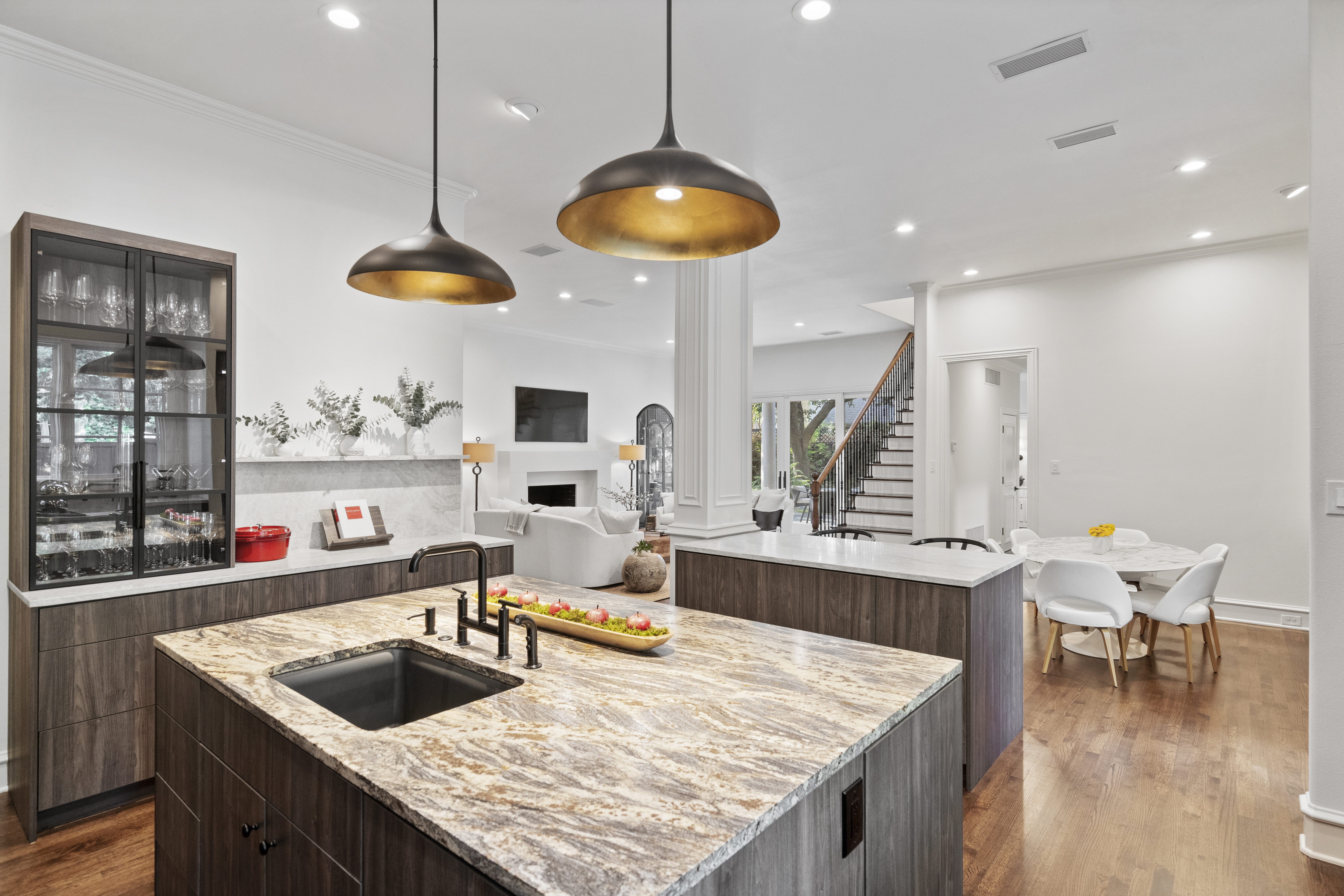 6607 Meadow Road Dallas, TX 75230 - Photo 12 of 32 a kitchen with a dining table and chairs