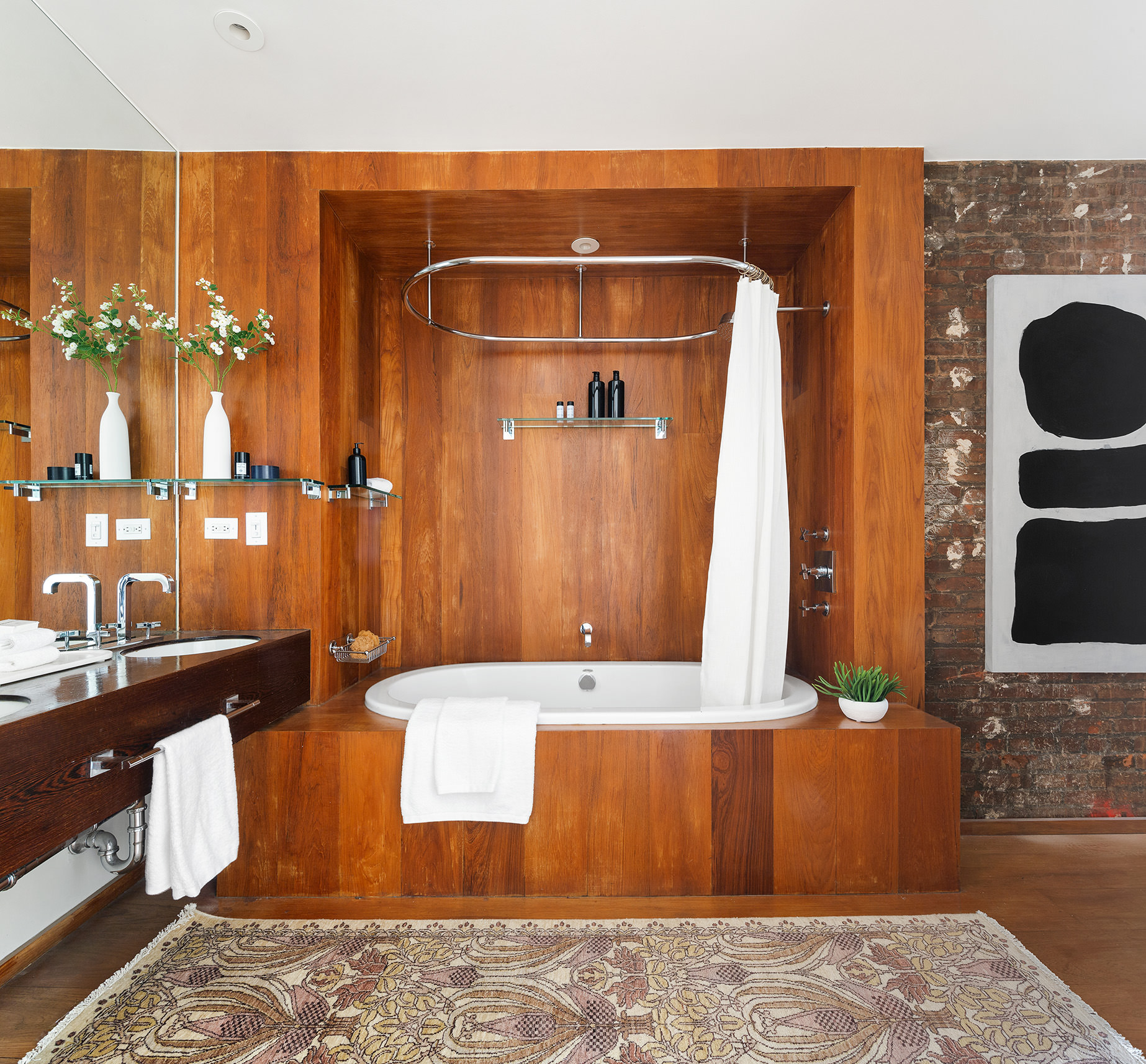 145 6th Avenue, Unit 2B Manhattan, NY 10013 - Photo 20 of 23 a bathroom with a bathtub and a sink